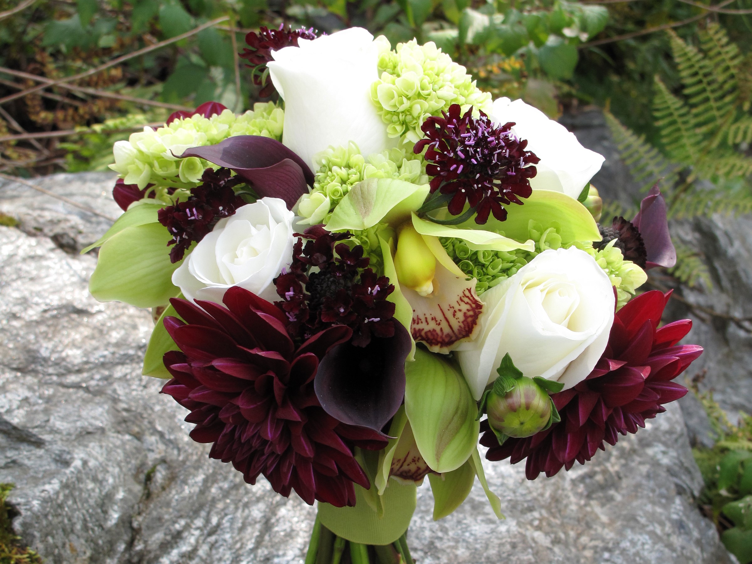 Wedding bouquet with roses, dahlias, callas, and orchids HD Wallpaper
