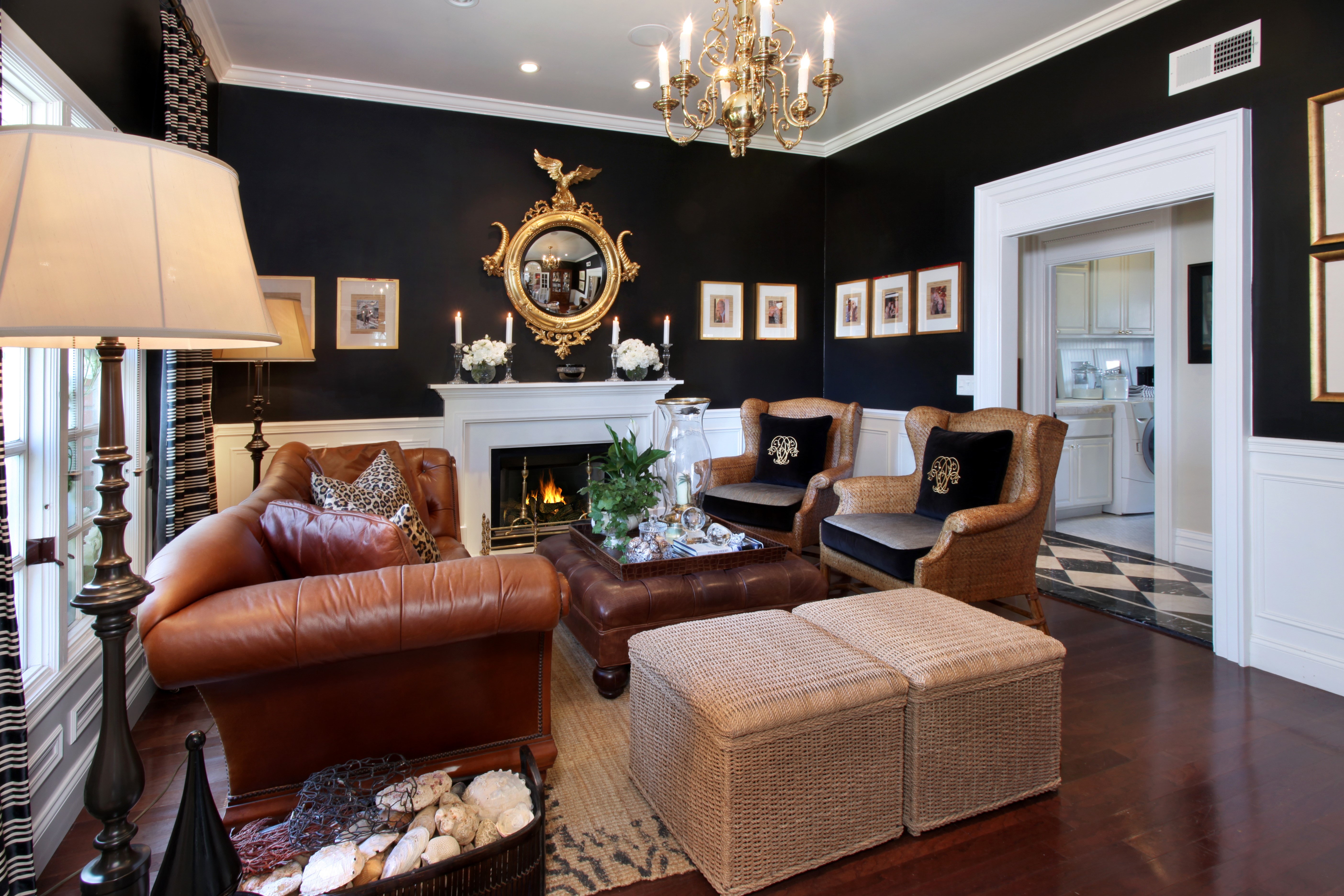 Living room with leather sofa, armchairs, and chandelier HD Wallpaper