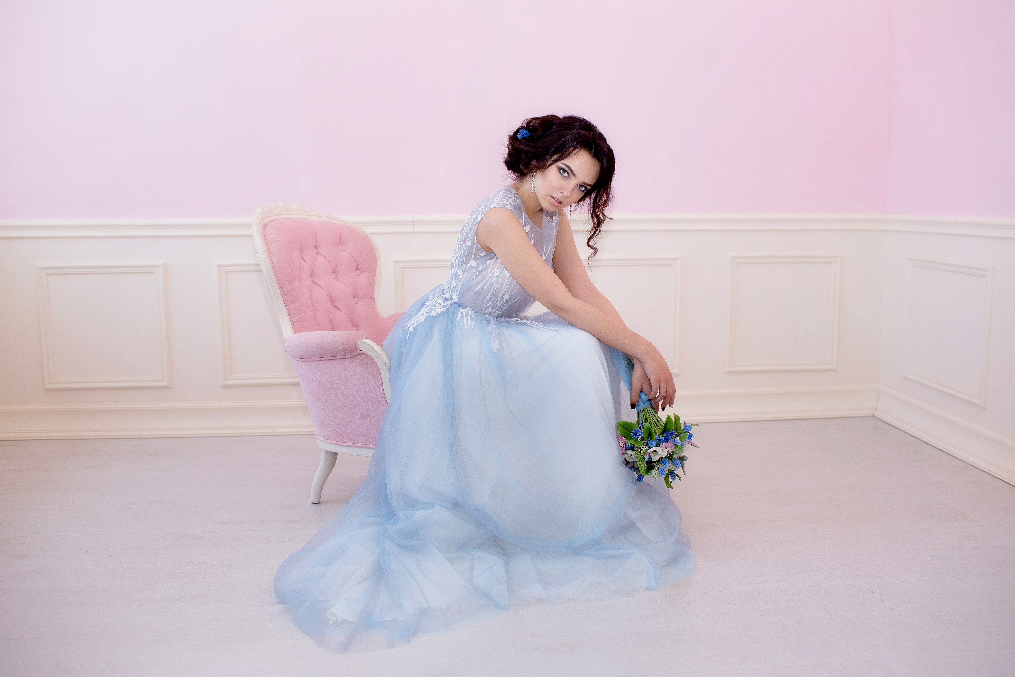 Brunette girl in a blue dress with a bouquet HD Wallpaper