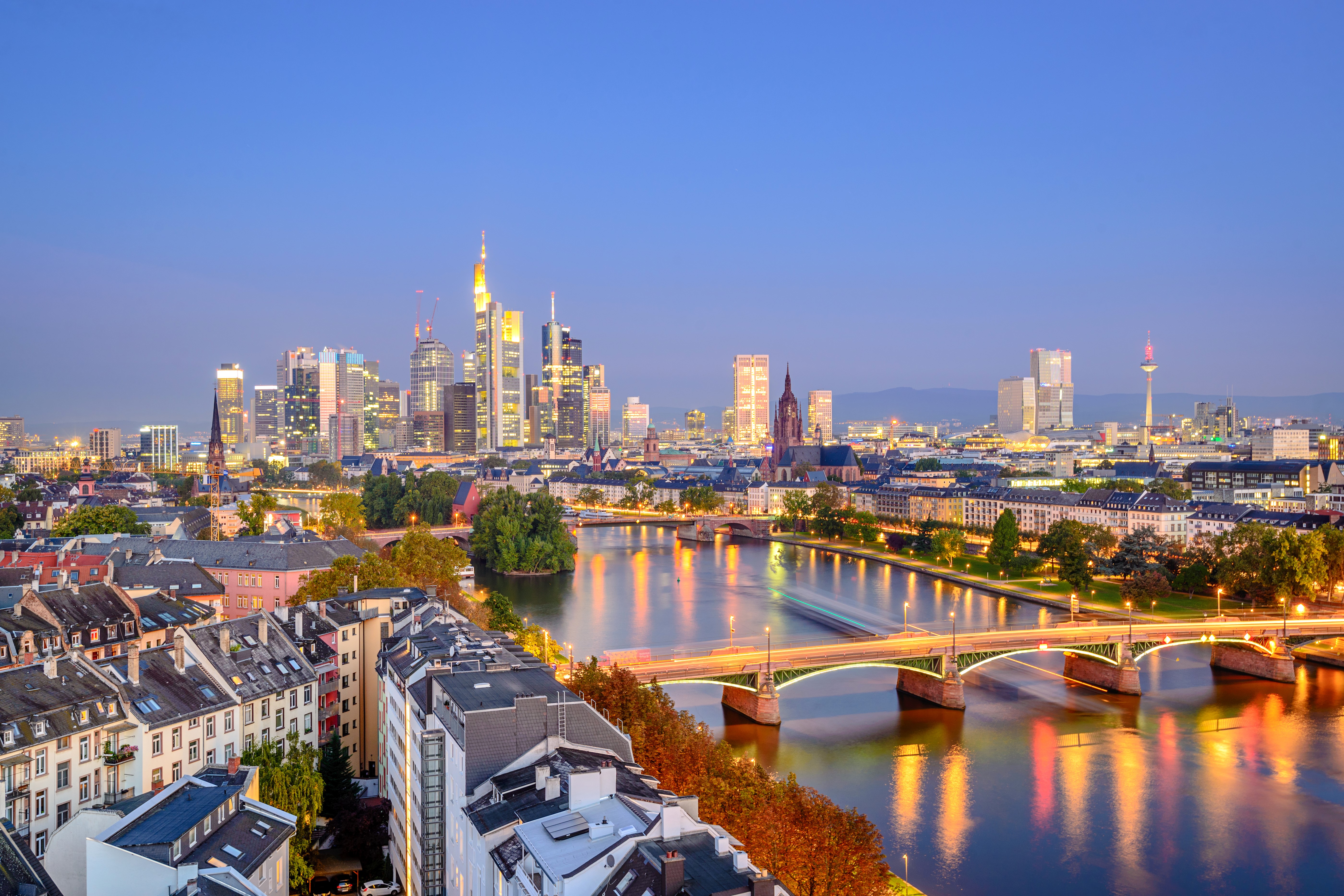 Frankfurt skyline with river and bridges at dusk HD Wallpaper