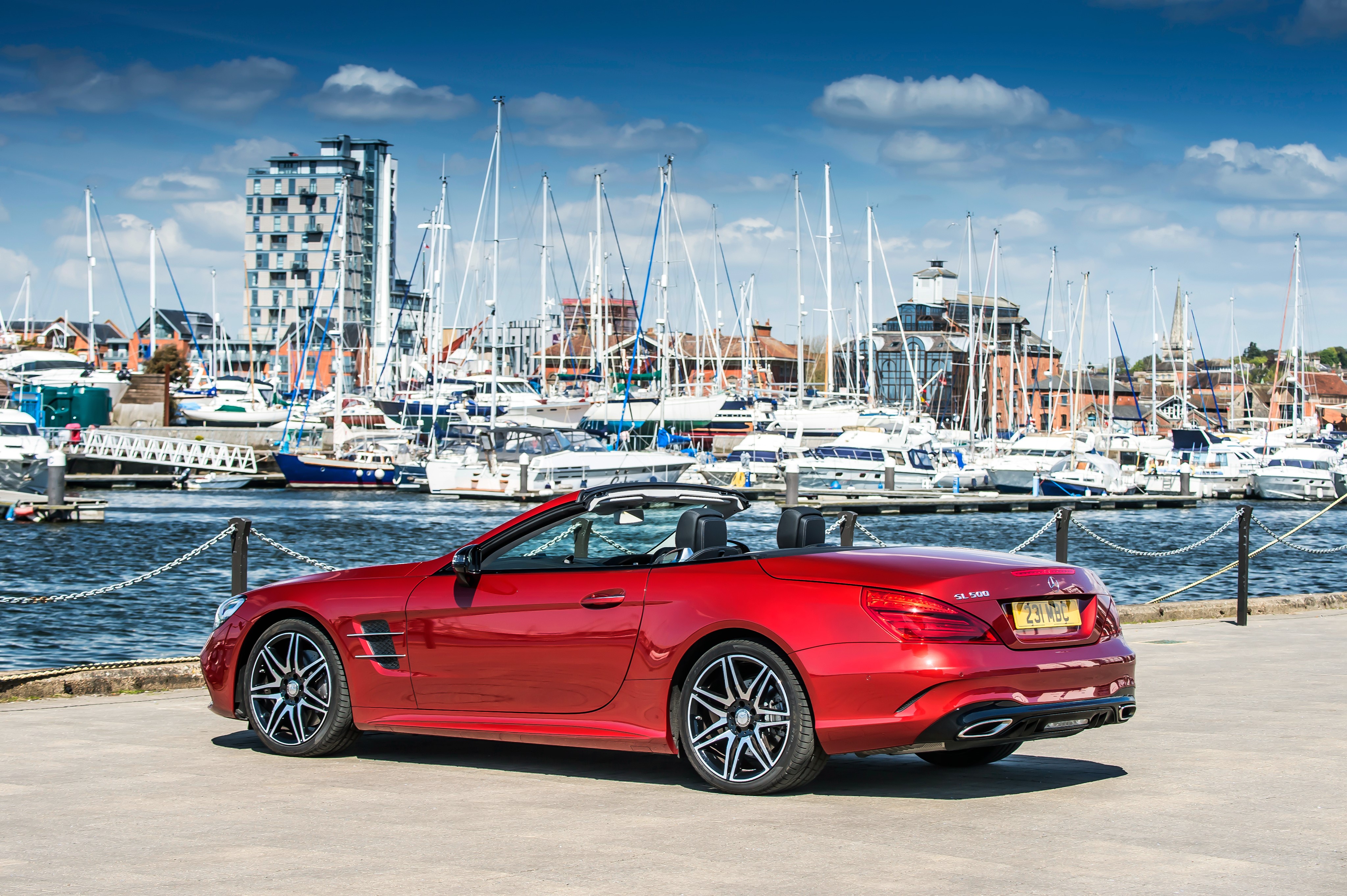 Red Mercedes-Benz AMG SL-Class Roadster in a Marina HD Wallpaper