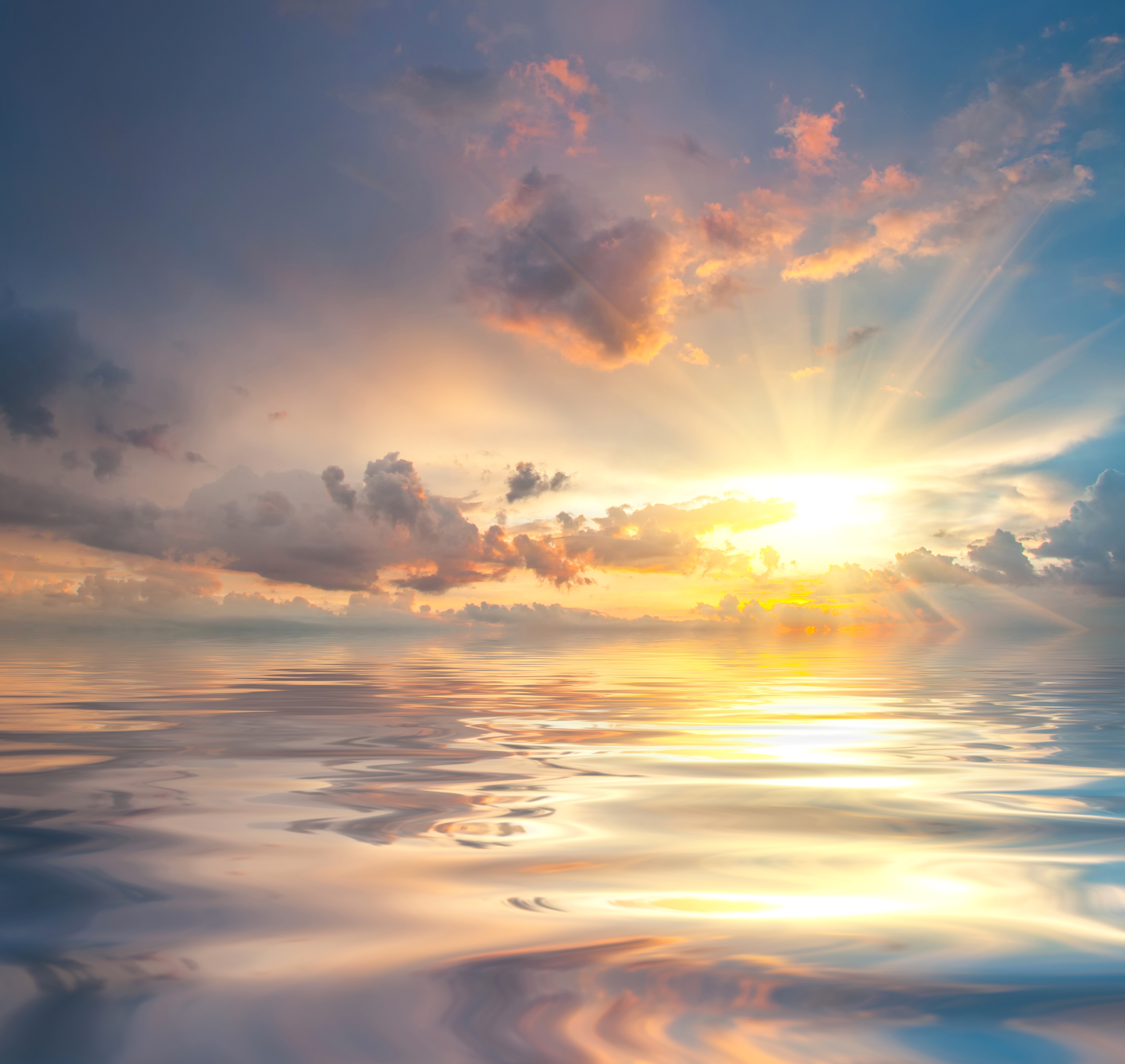 Sunset over the ocean with clouds and sun rays HD Wallpaper