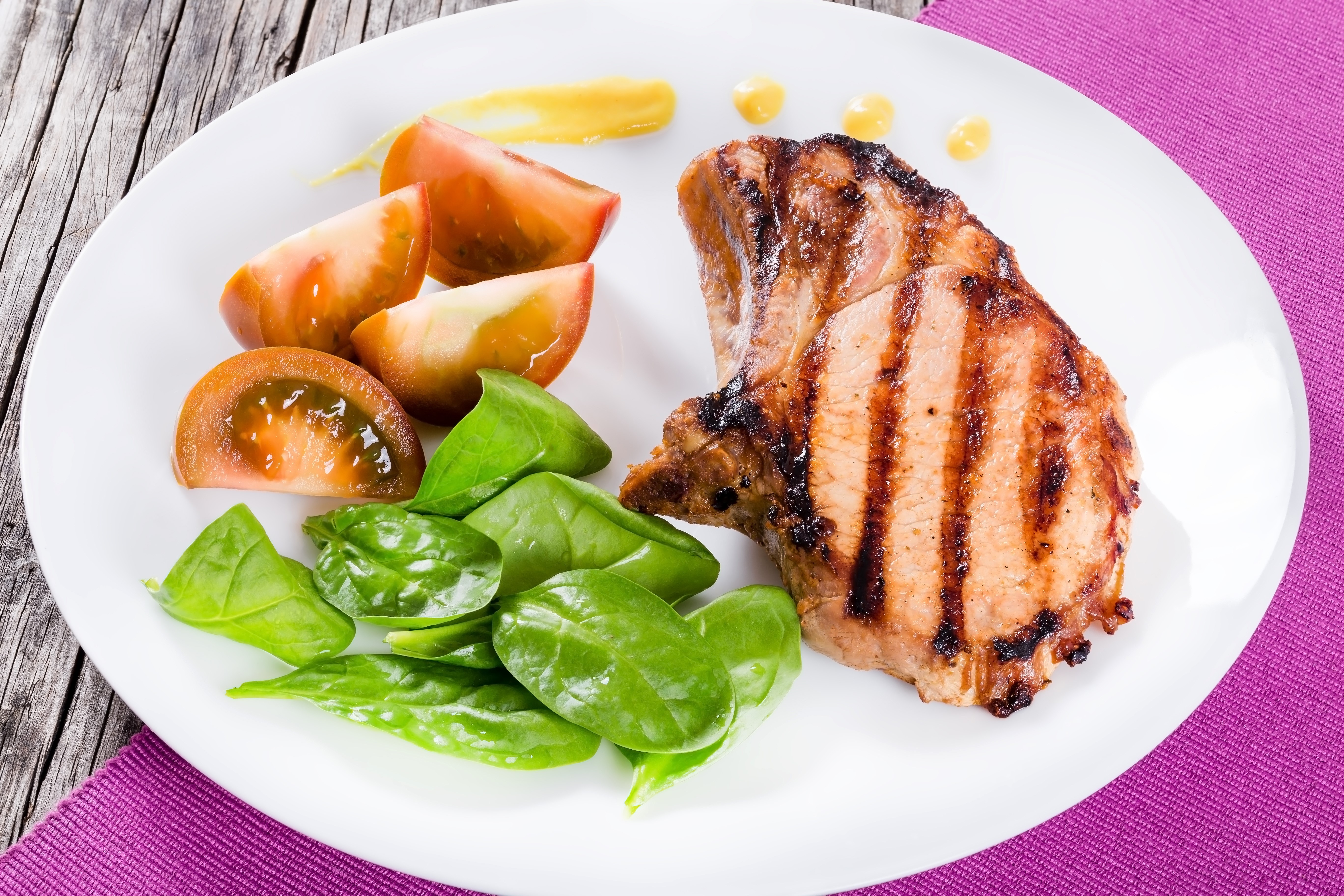 Grilled pork chop with tomatoes and spinach HD Wallpaper