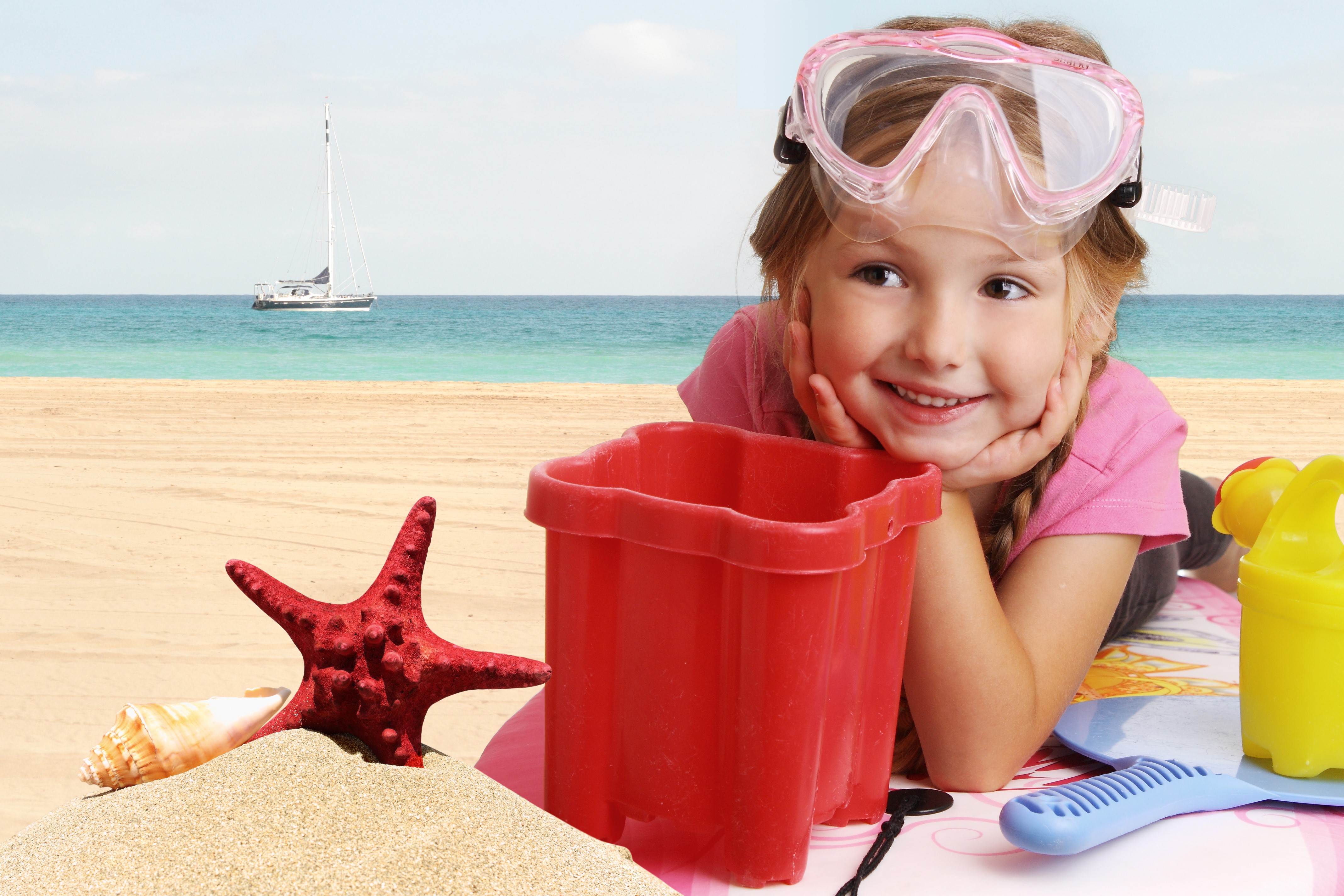 Girl with Goggles and Beach Toys HD Wallpaper