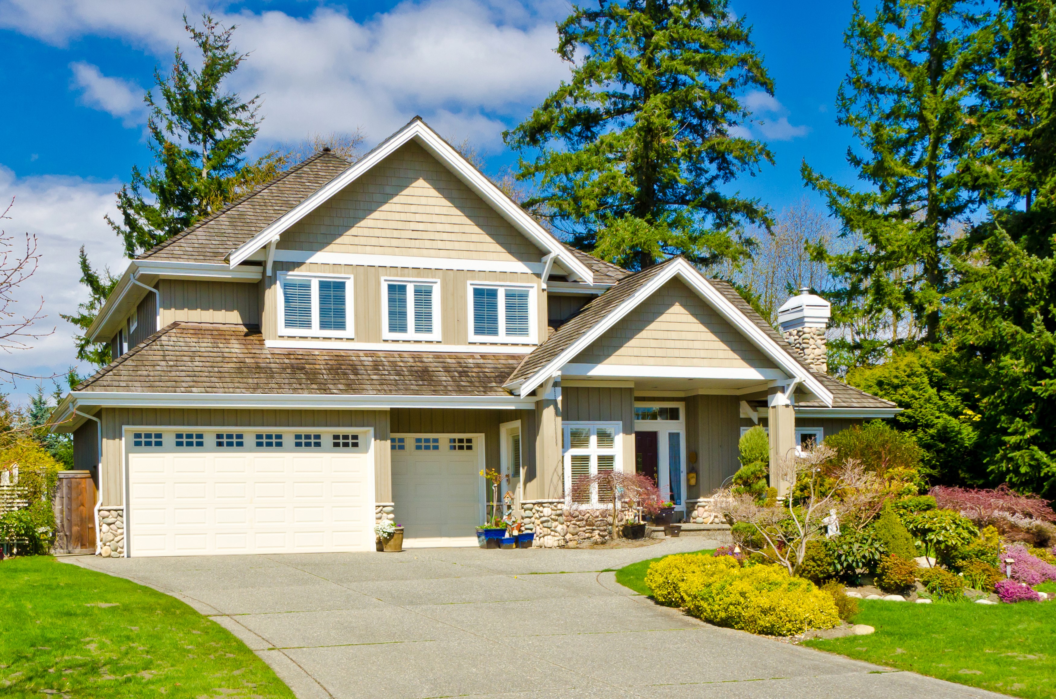 Luxury house with garage and manicured garden HD Wallpaper