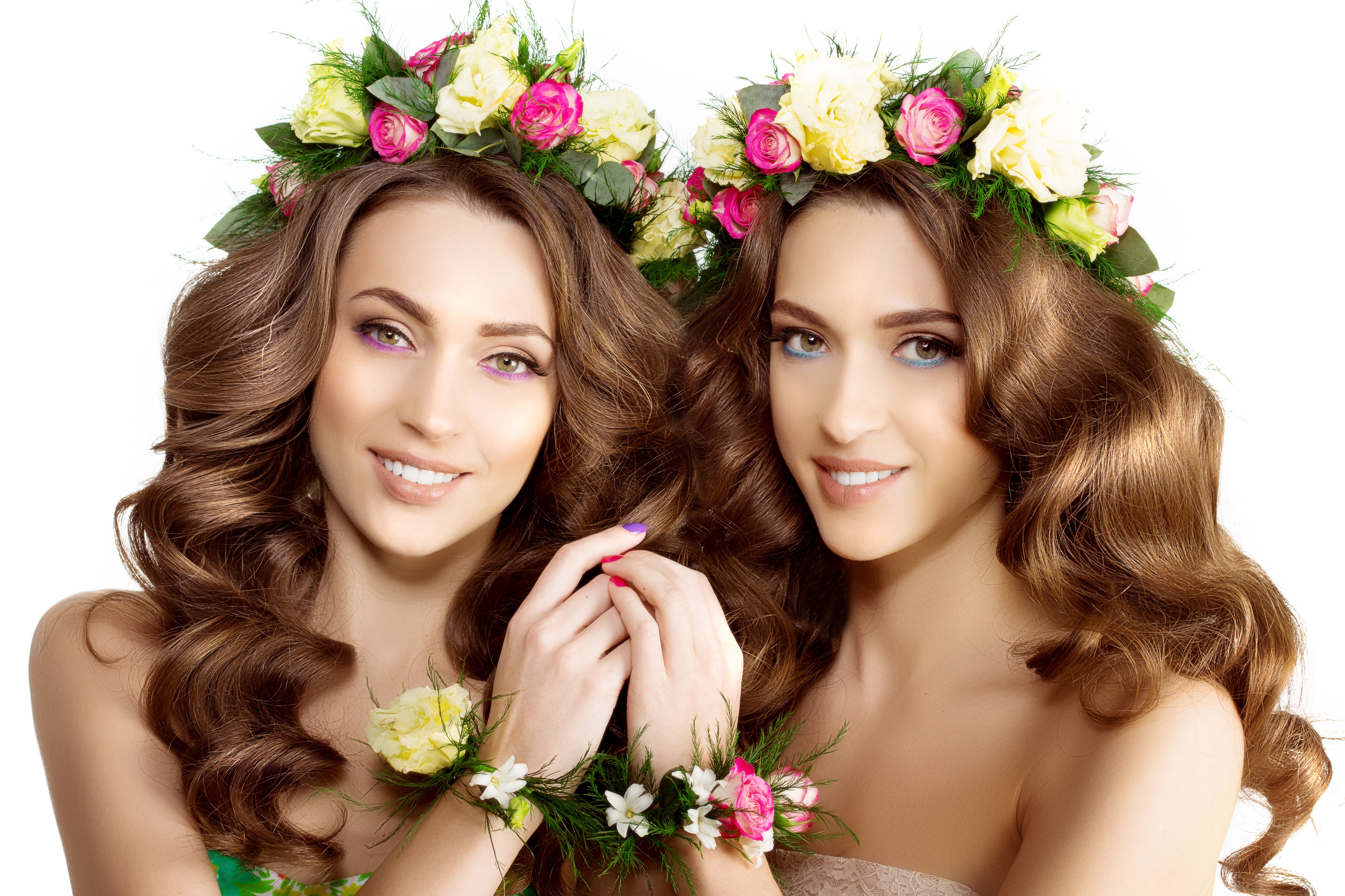 Two brown-haired women with flower crowns HD Wallpaper