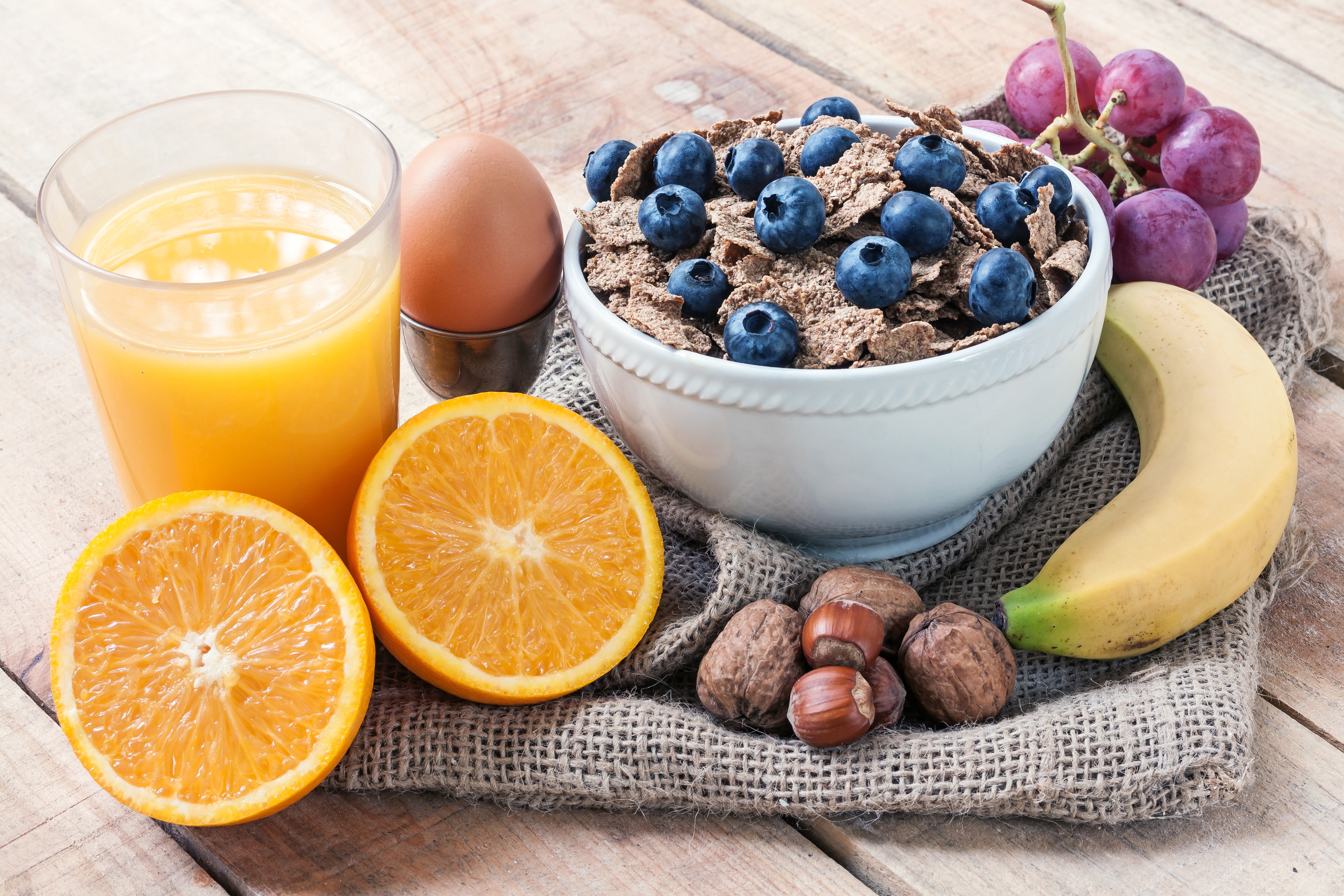 Still-life of a healthy breakfast with muesli, fruit, and egg HD Wallpaper