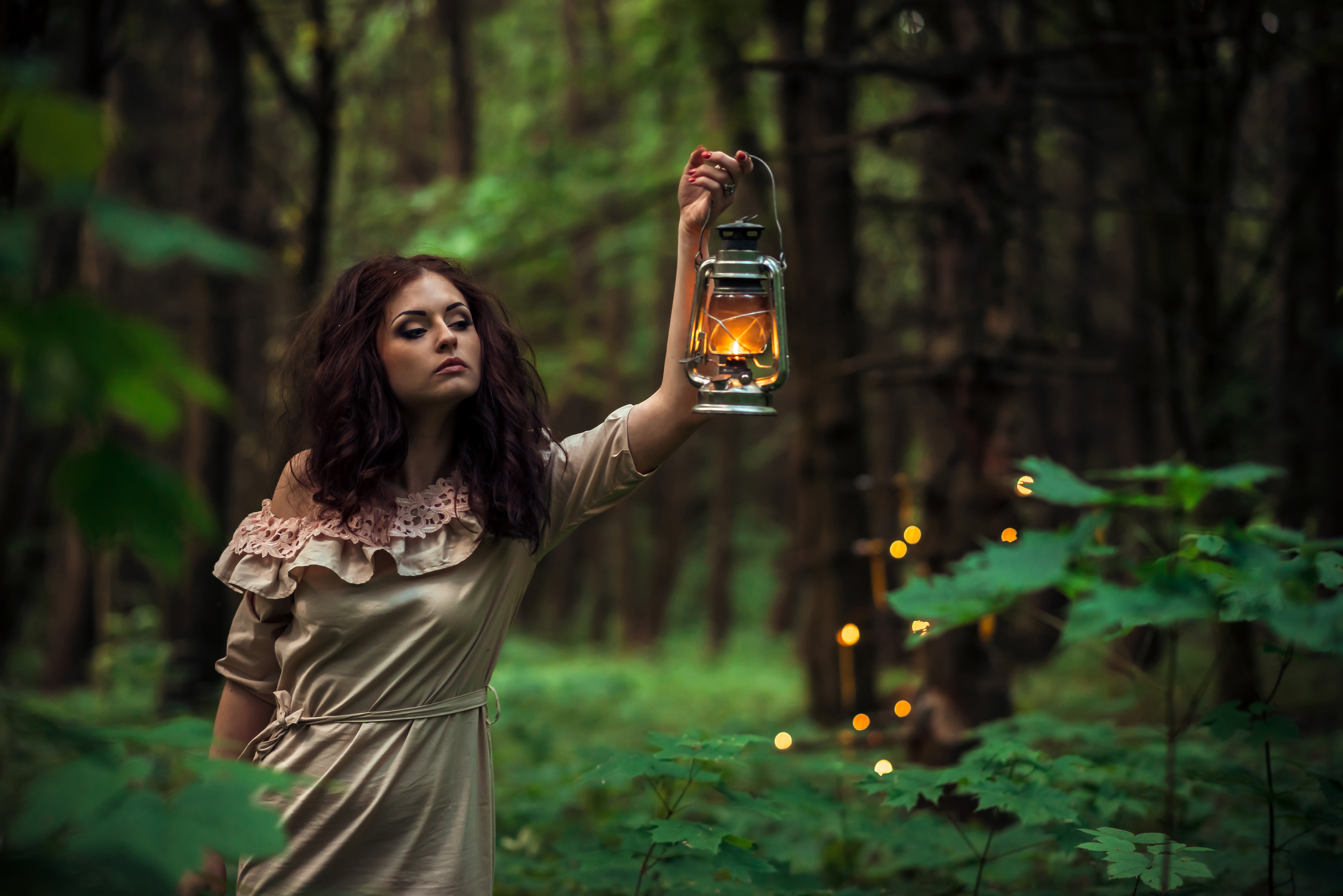Woman with Kerosene Lamp in Forest HD Wallpaper