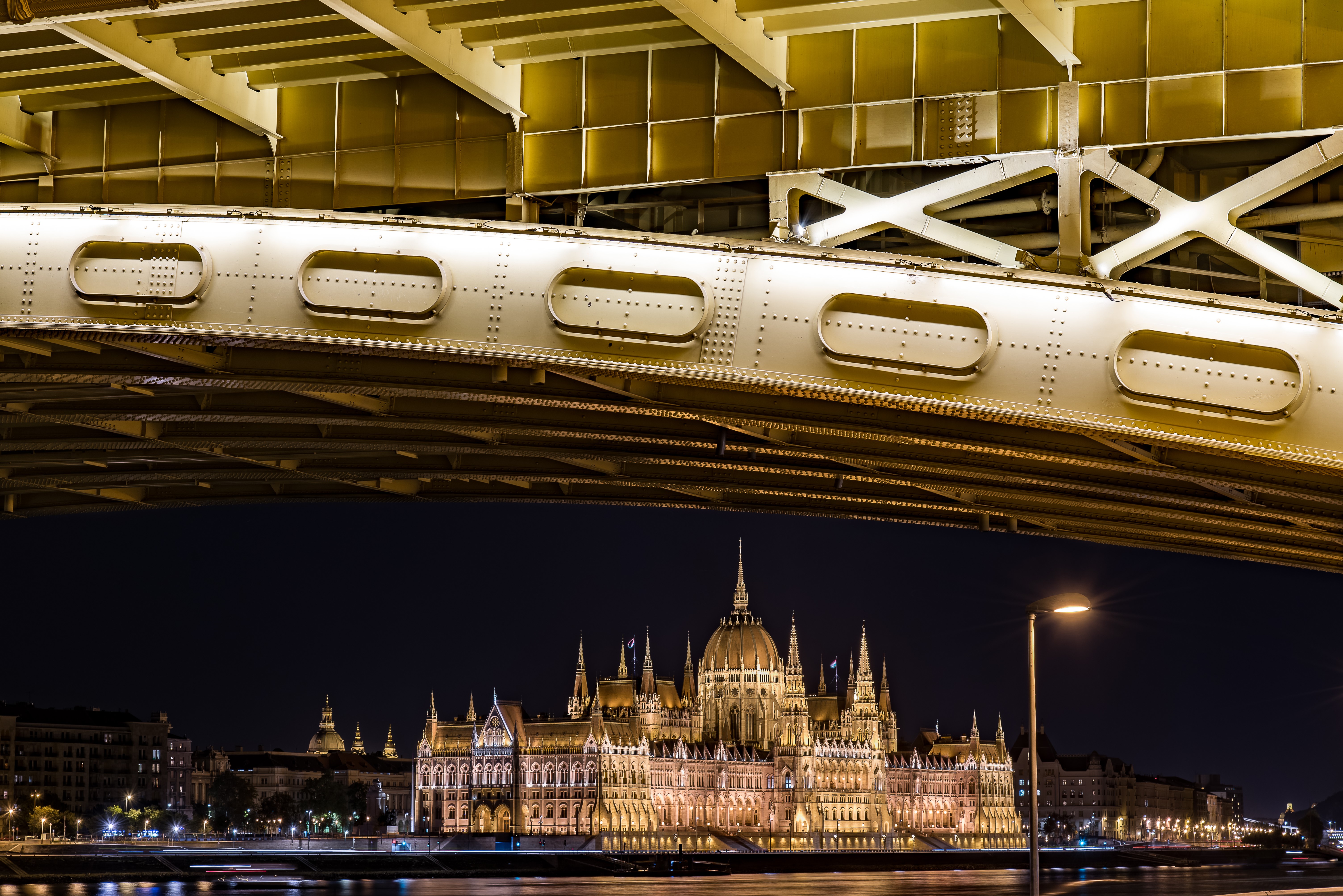 Budapest Parliament Building at Night Under a Bridge HD Wallpaper