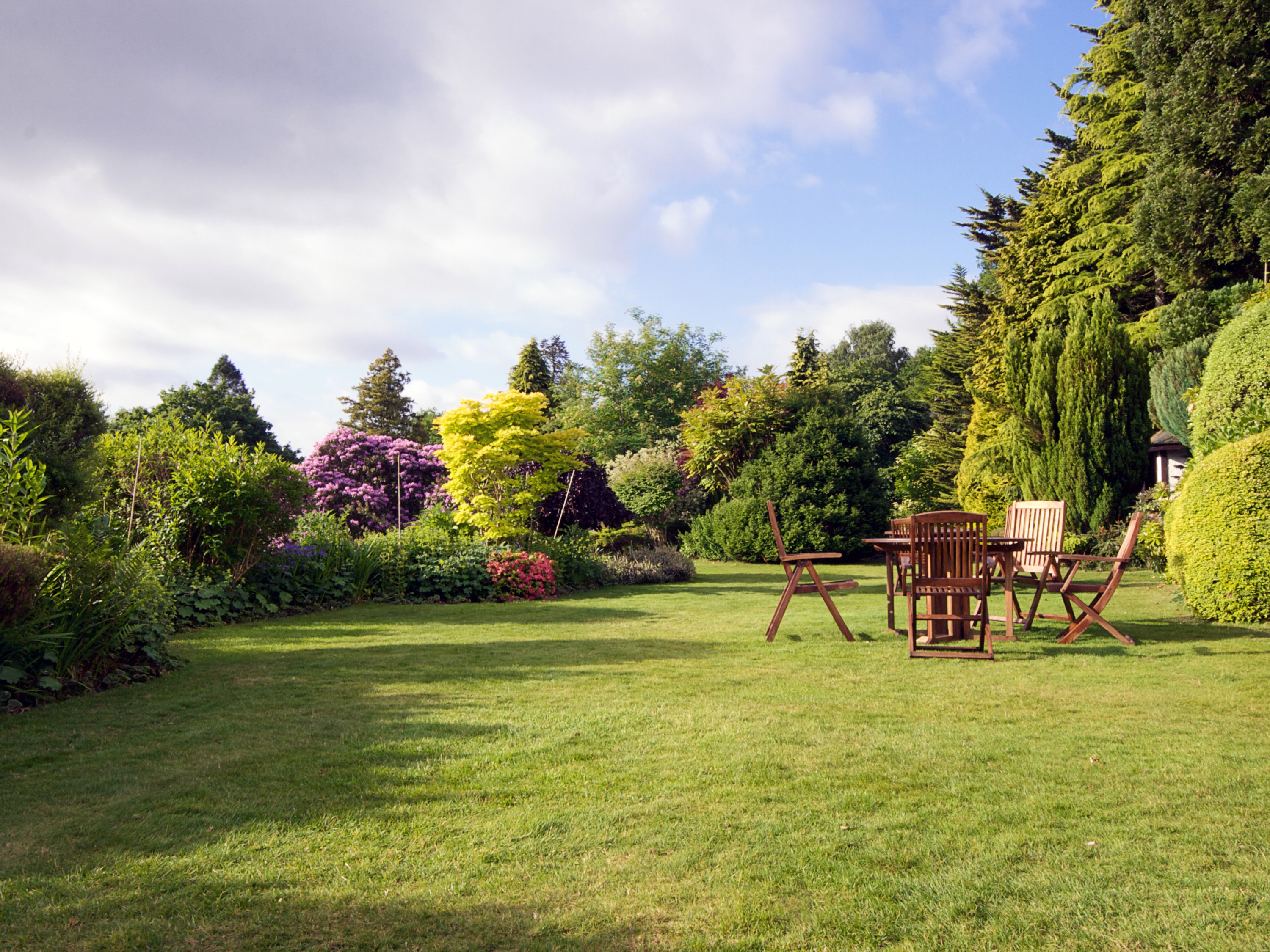 Garden with lawn and outdoor furniture HD Wallpaper