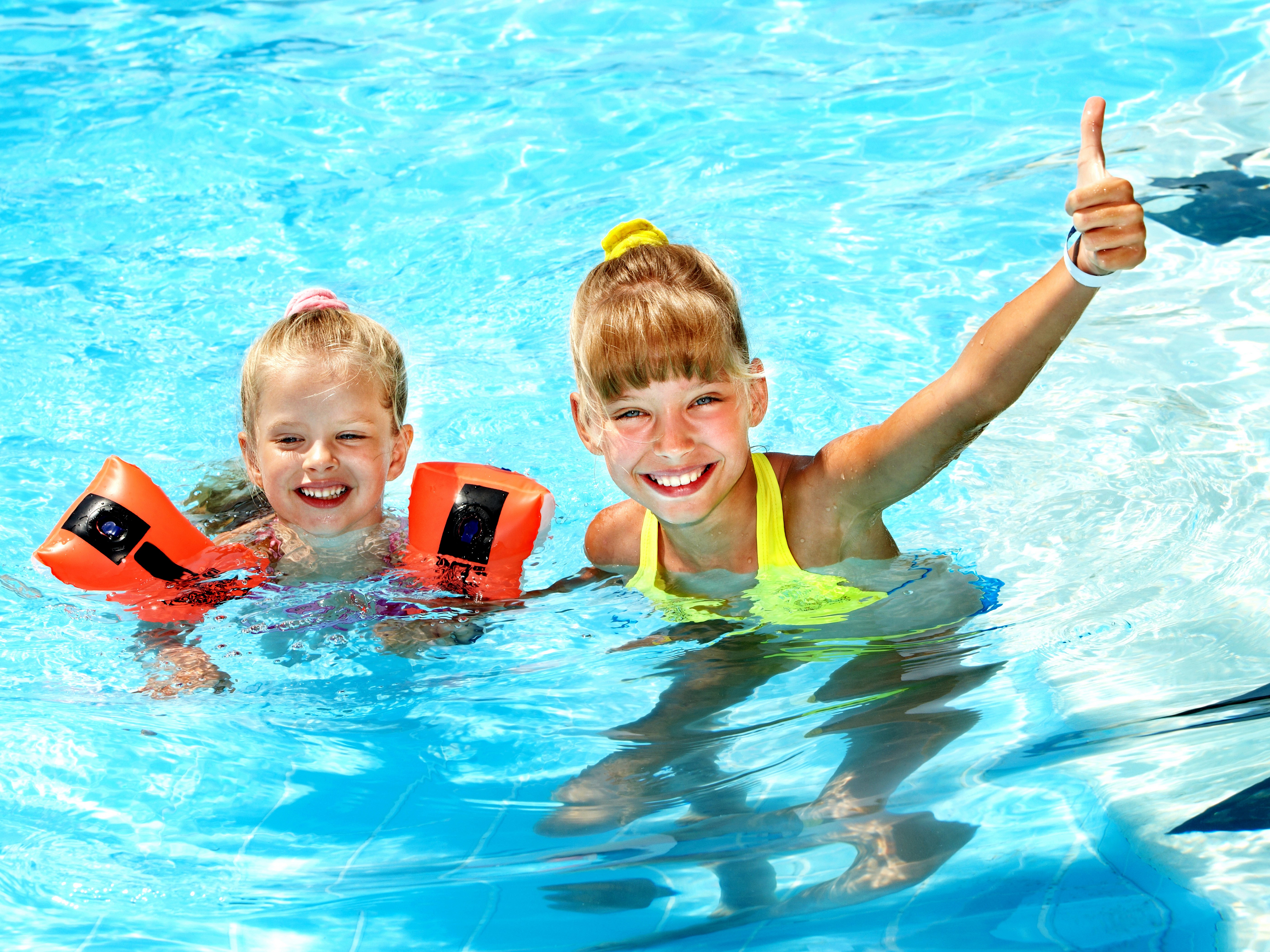 Happy Little Girls Smiling in Pool Water 4K HD Wallpaper