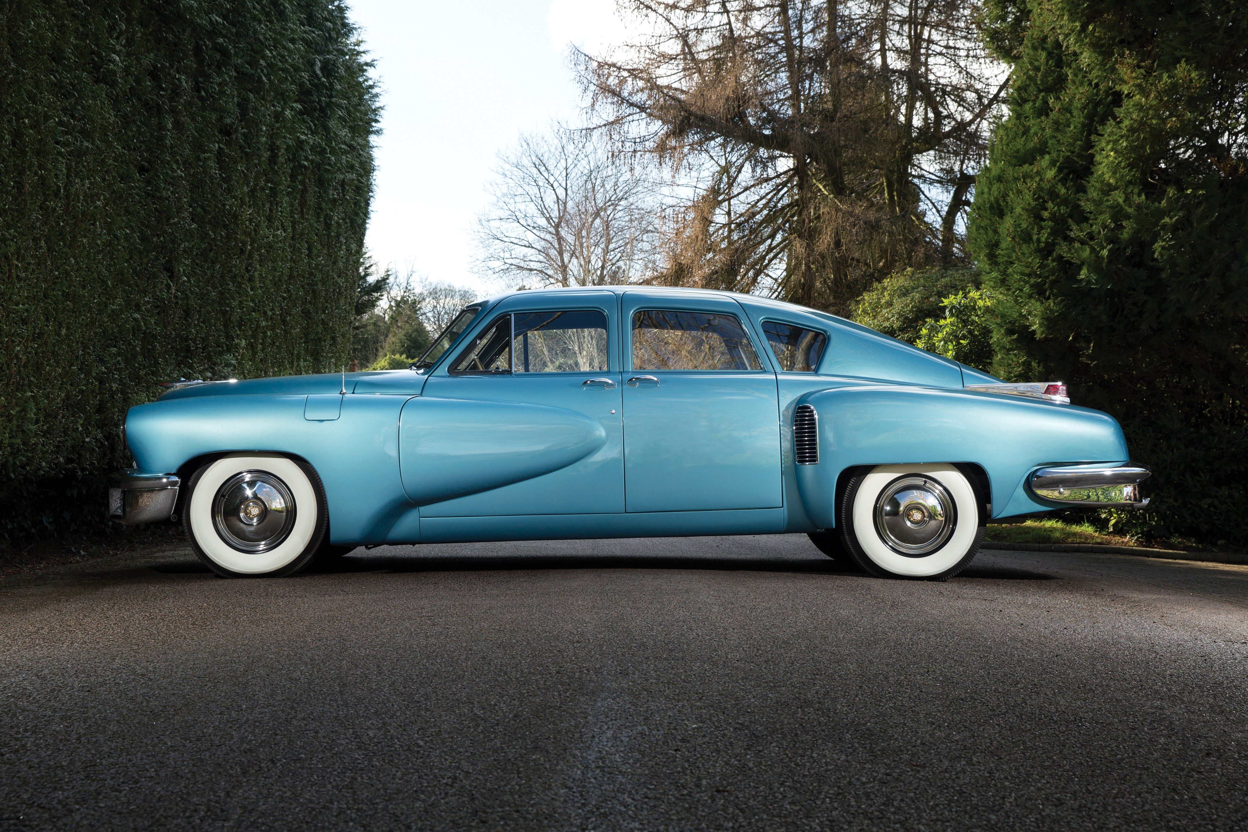 1948 Tucker Sedan in light blue, side view HD Wallpaper