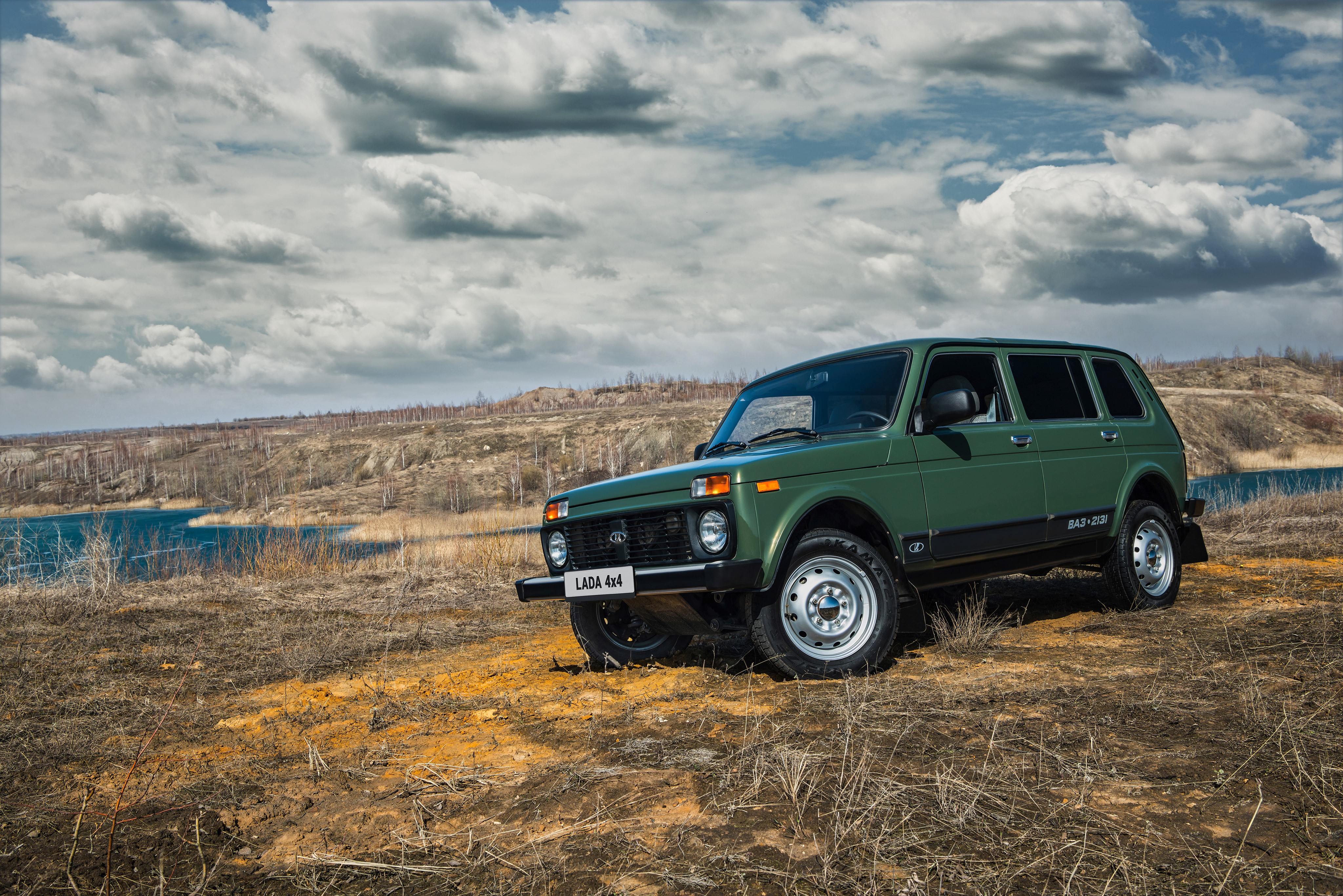 Green Lada 4x4 (2131) SUV parked by a lake HD Wallpaper