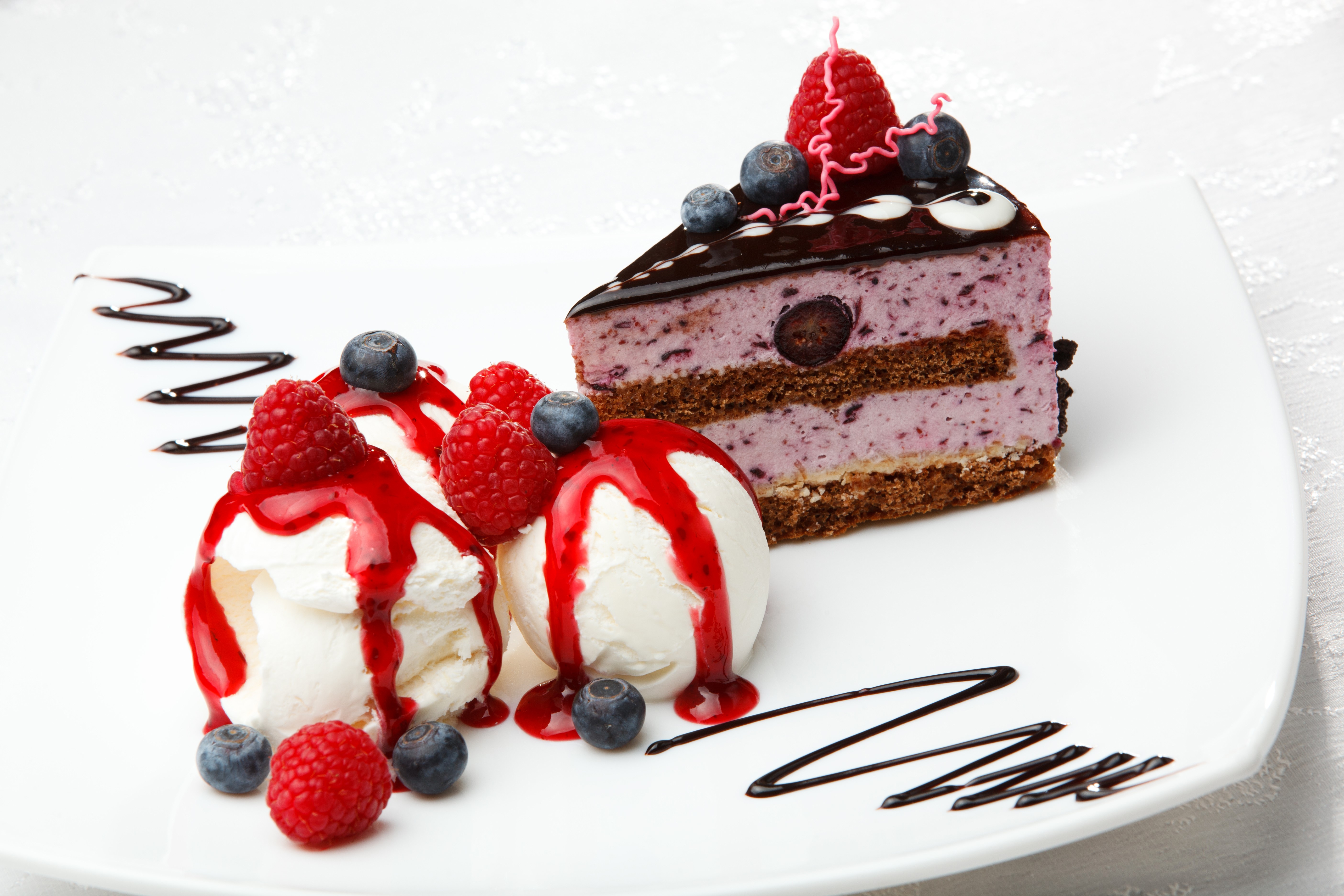 Slice of blueberry cake with ice cream and berries HD Wallpaper