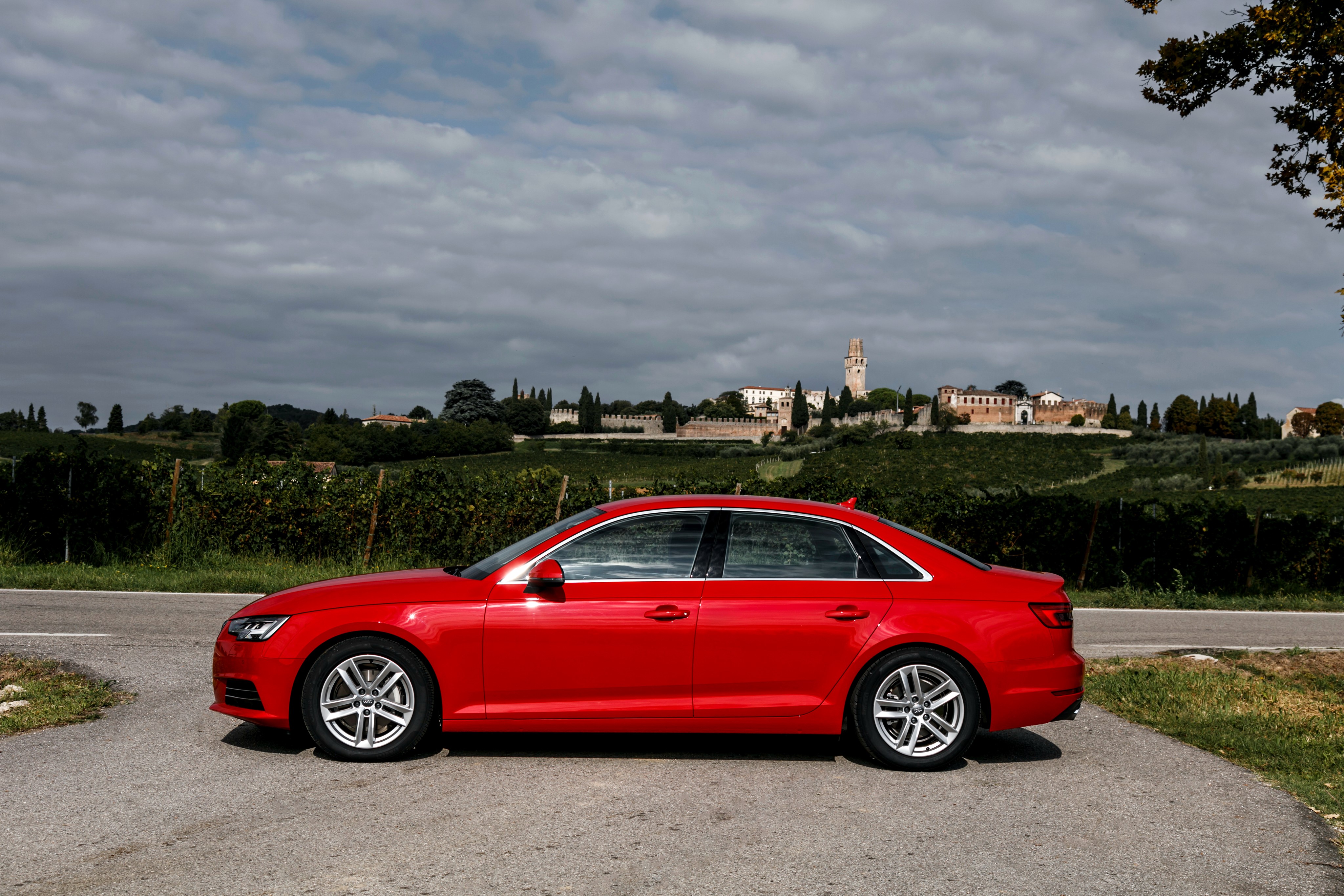 Red Audi A4 2.0 TDI ultra parked on road HD Wallpaper