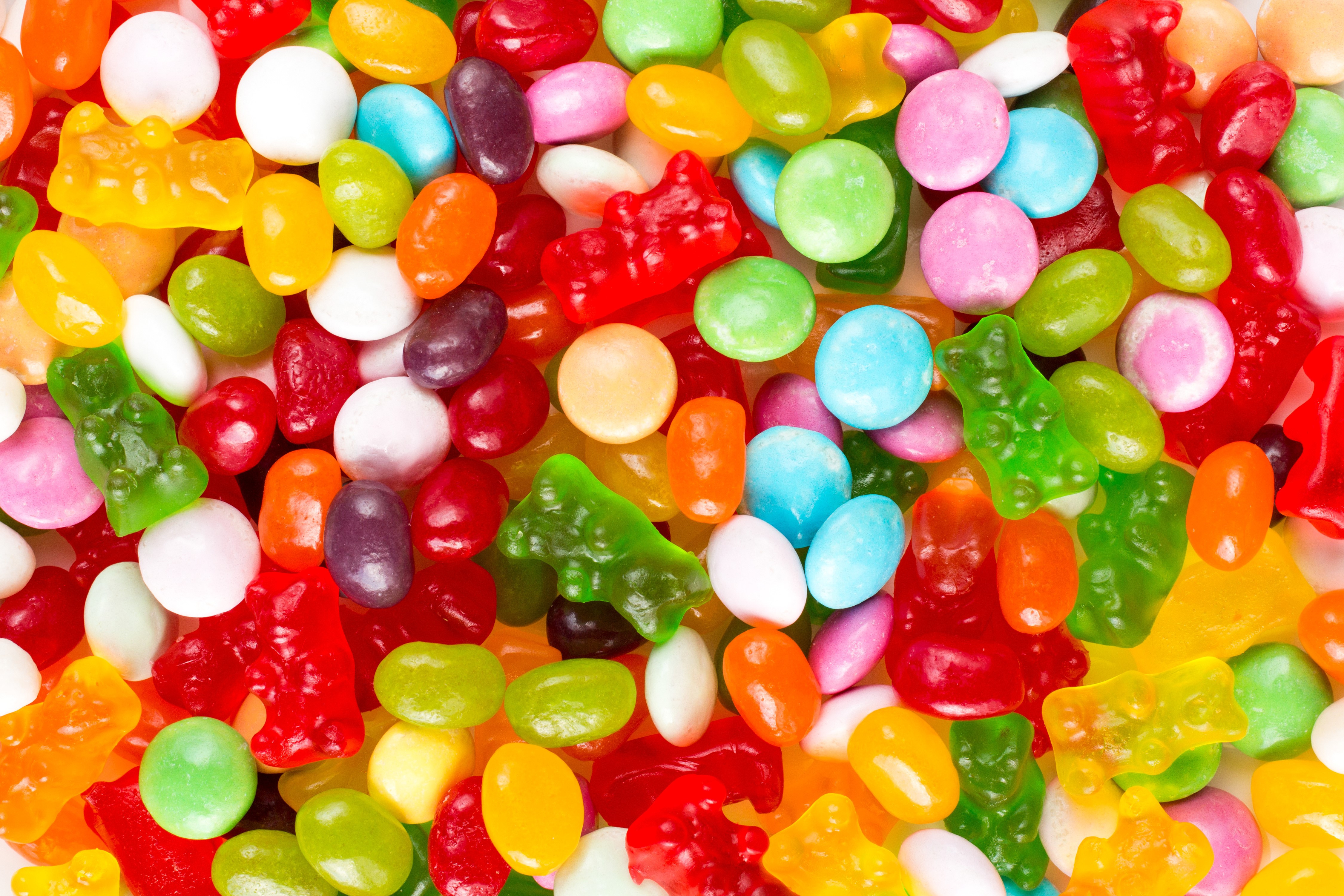 Assortment of colorful candies and jellies HD Wallpaper