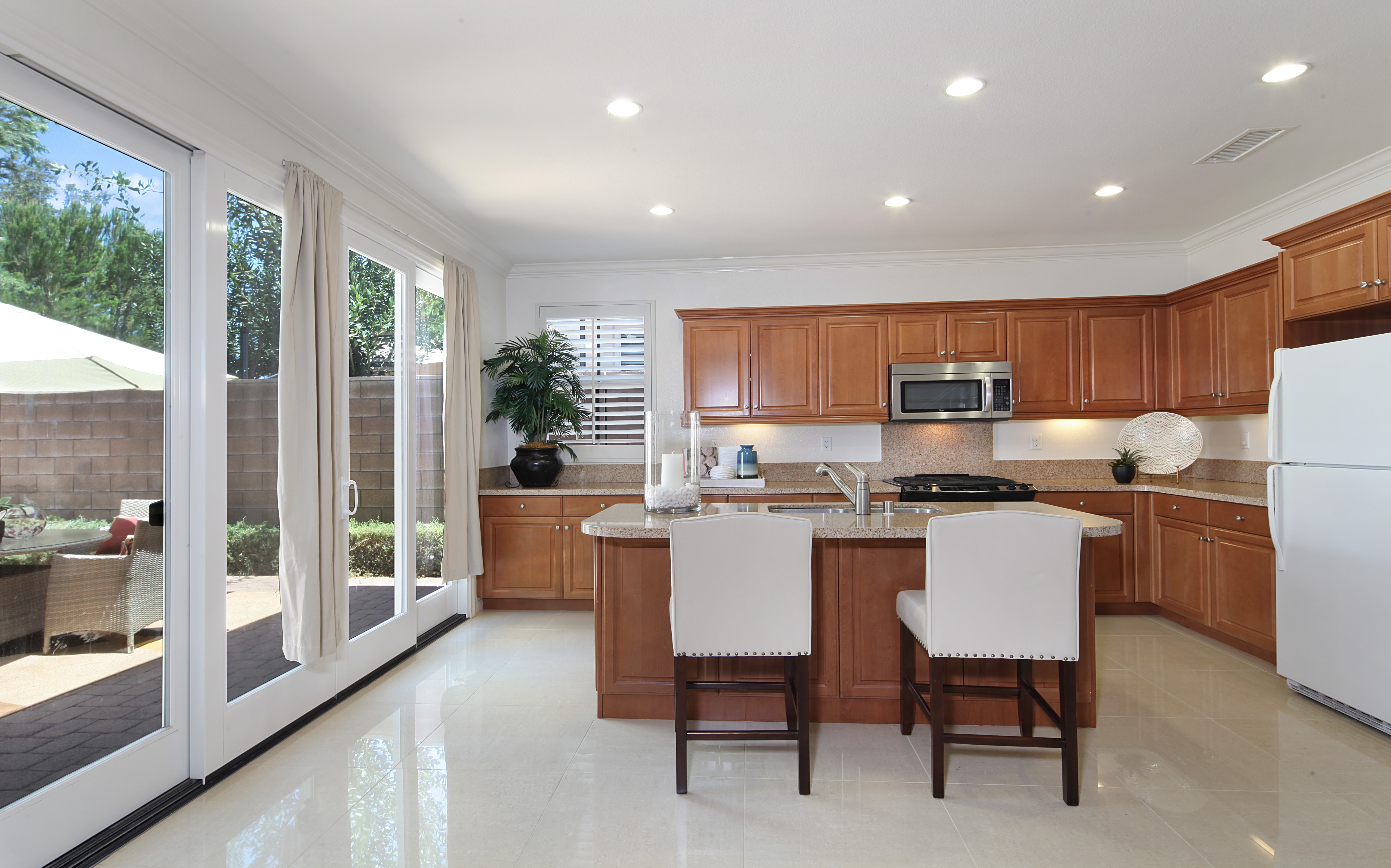 Kitchen with Island and Patio Doors HD Wallpaper