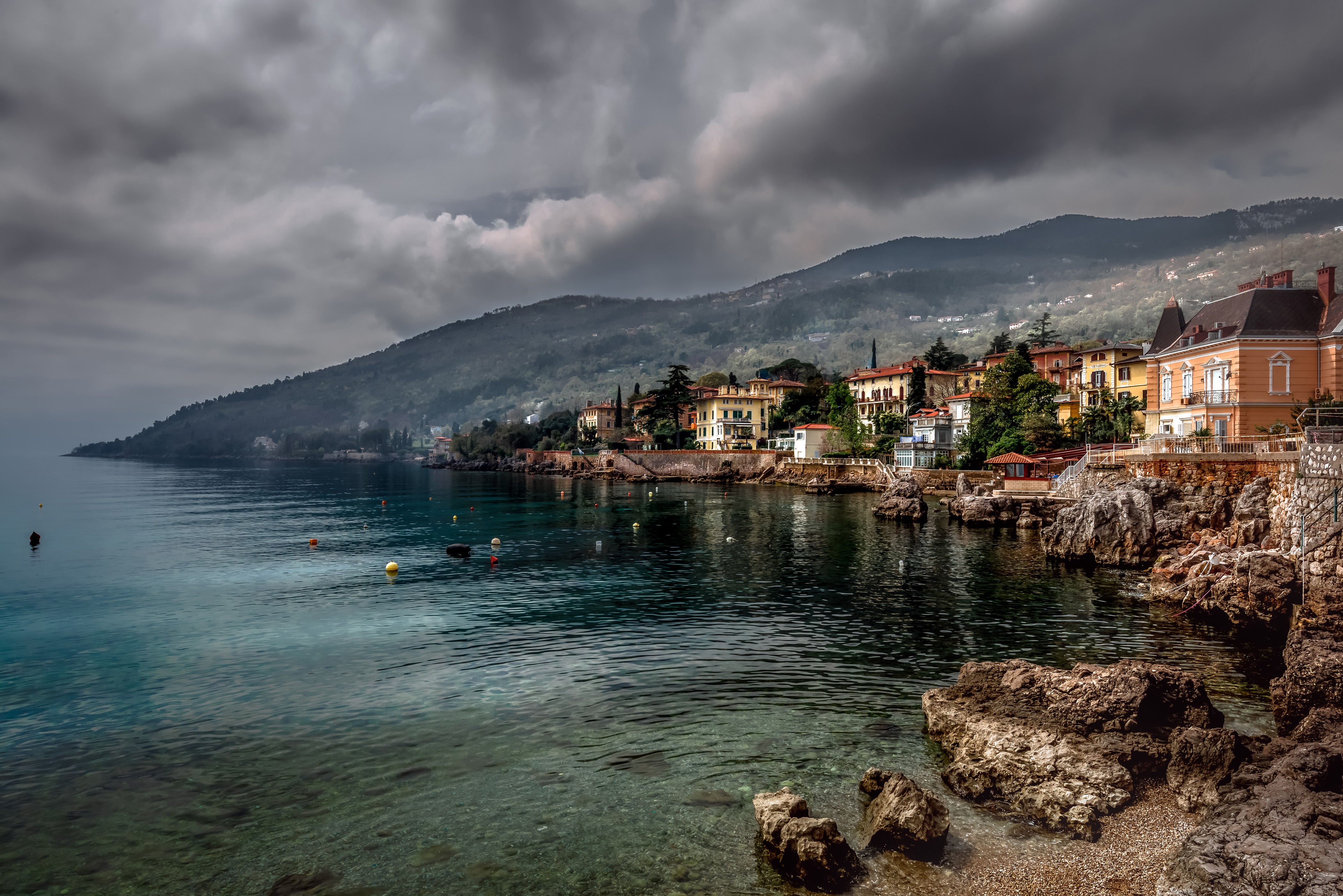Houses on the coast of Lovran, Croatia with mountains HD Wallpaper