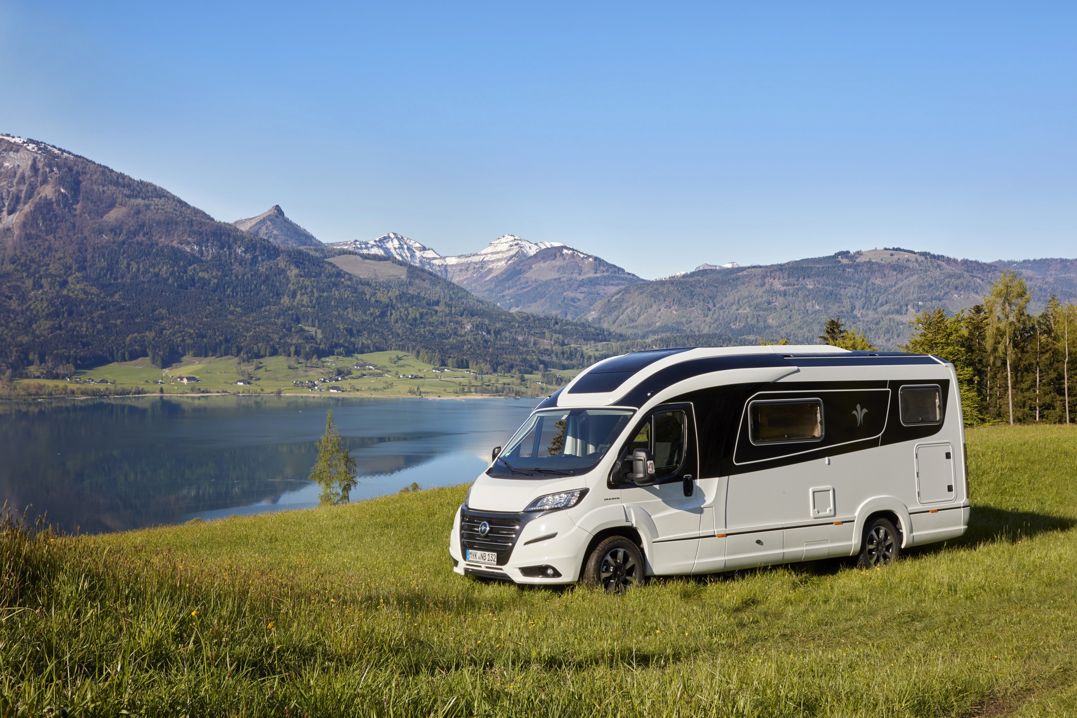 2017 Niesmann Bischoff Smove motorhome by a lake and mountains HD Wallpaper