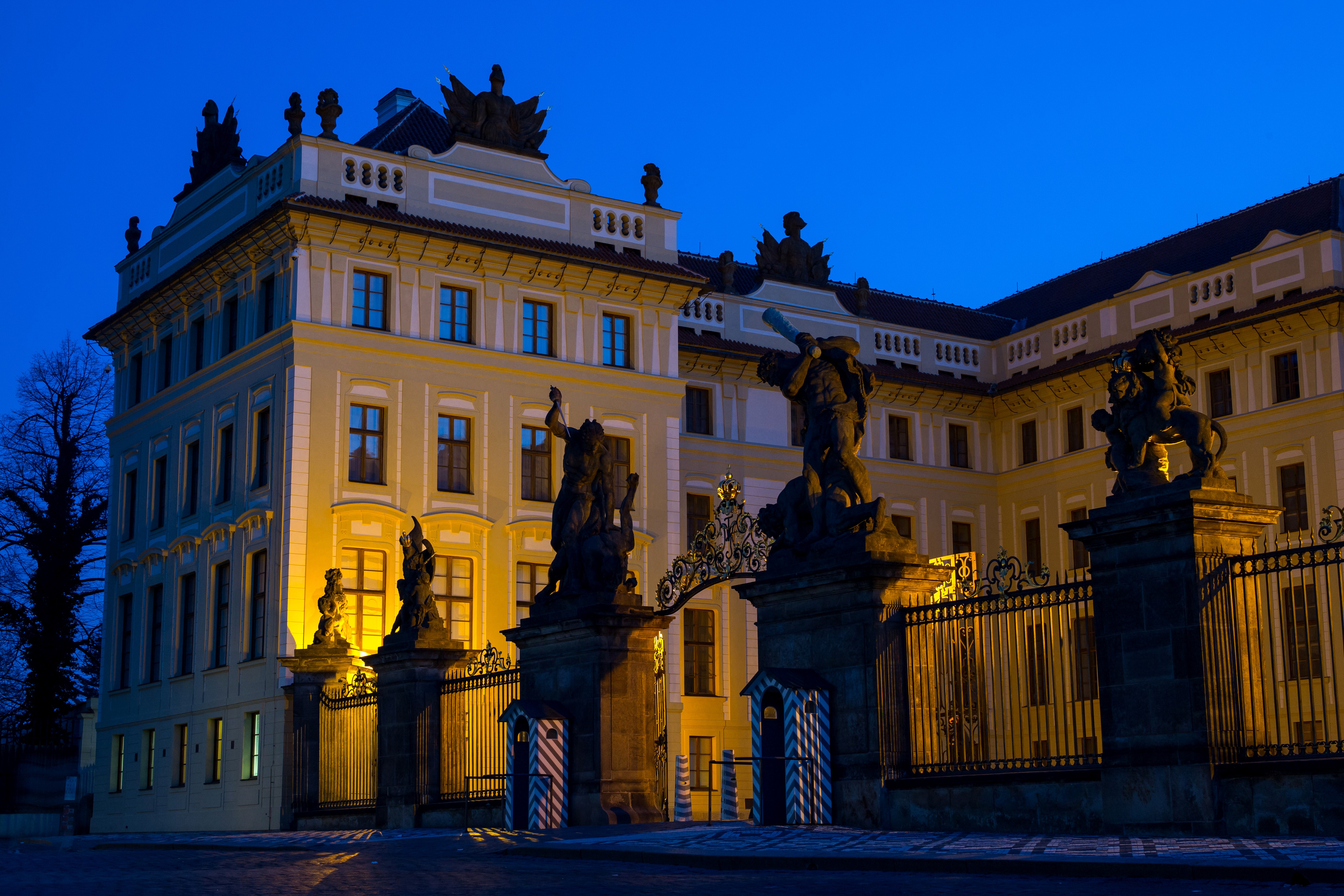 Prague Castle entrance sculptures at night HD Wallpaper