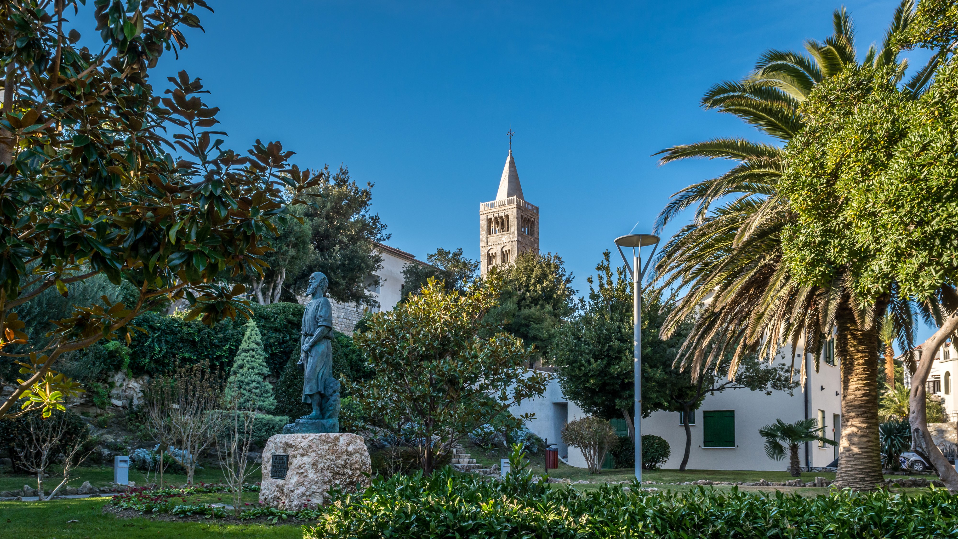 Statue and Bell Tower in Rab, Croatia HD Wallpaper