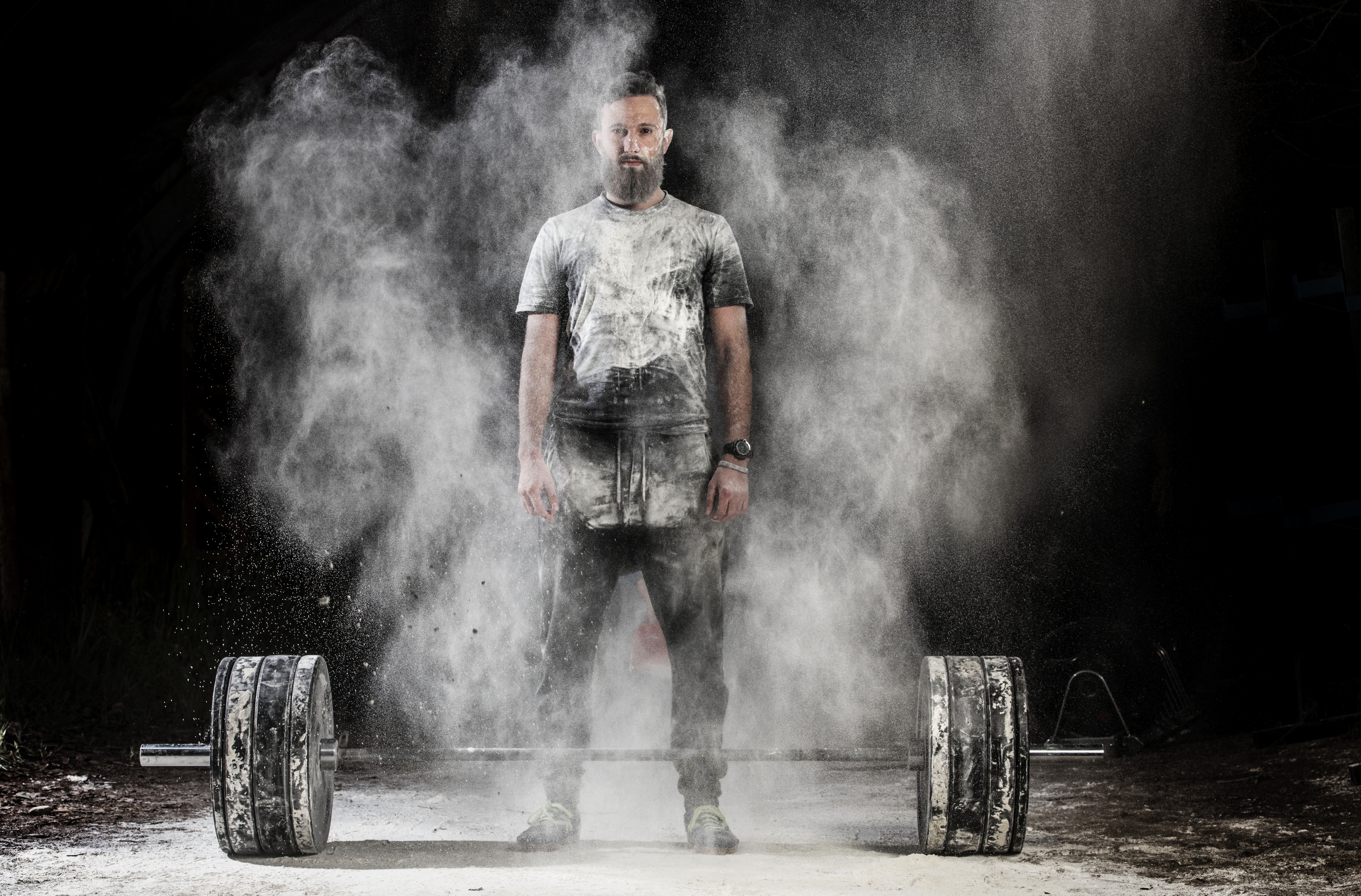Man with barbell covered in chalk dust HD Wallpaper