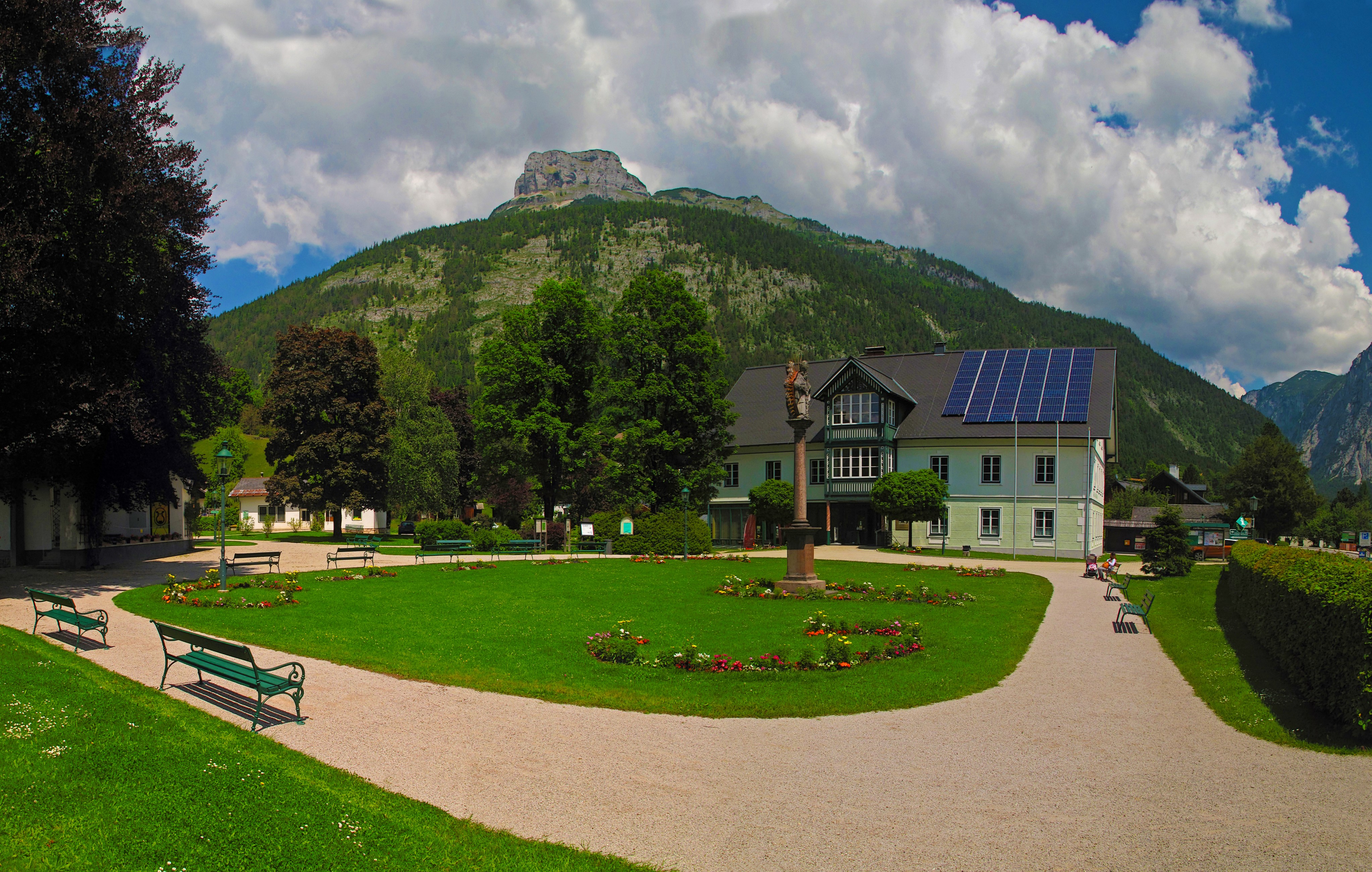 Park with a building and mountains in Altaussee, Austria HD Wallpaper