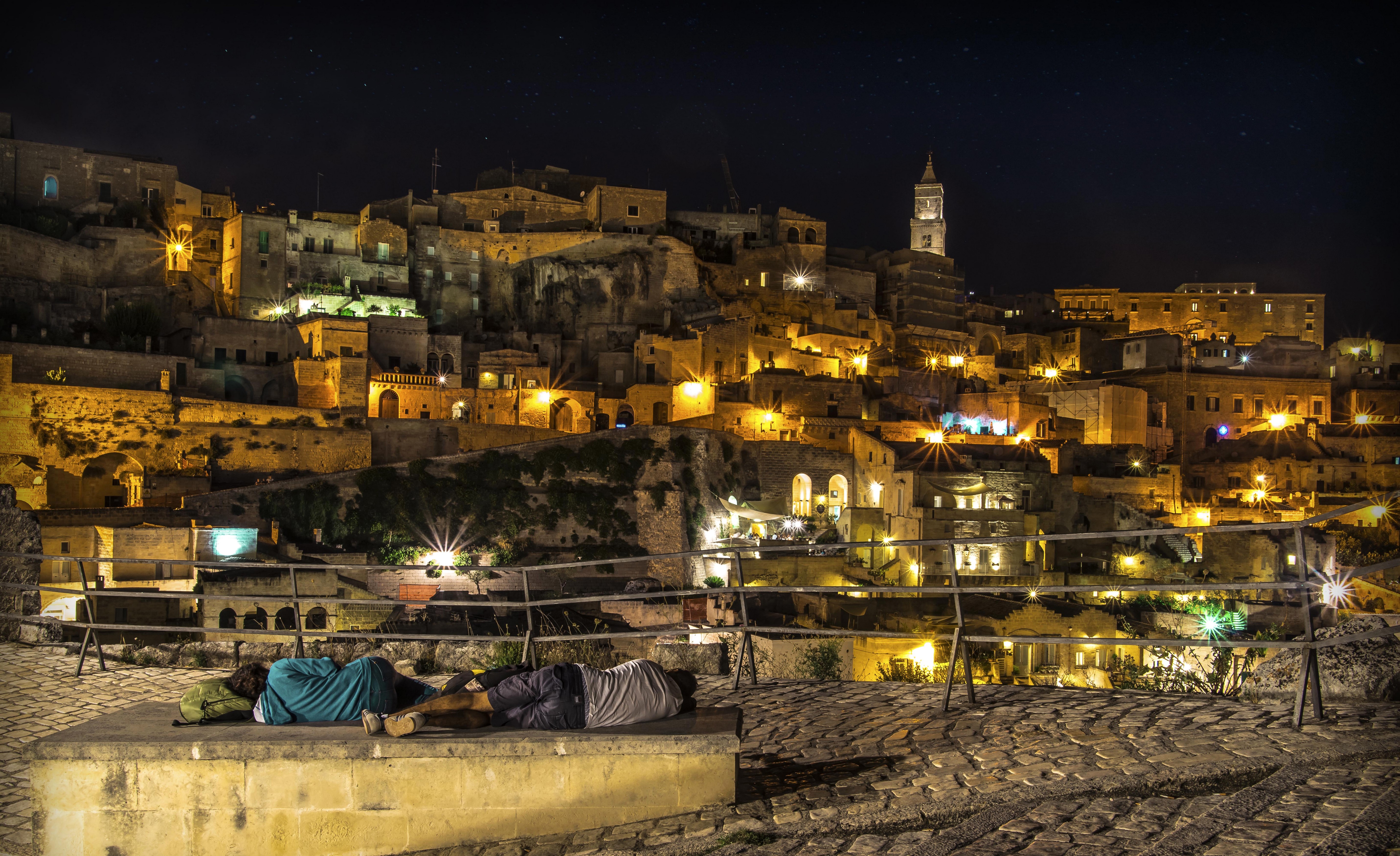 Matera, Italy at Night with Two People Sleeping HD Wallpaper