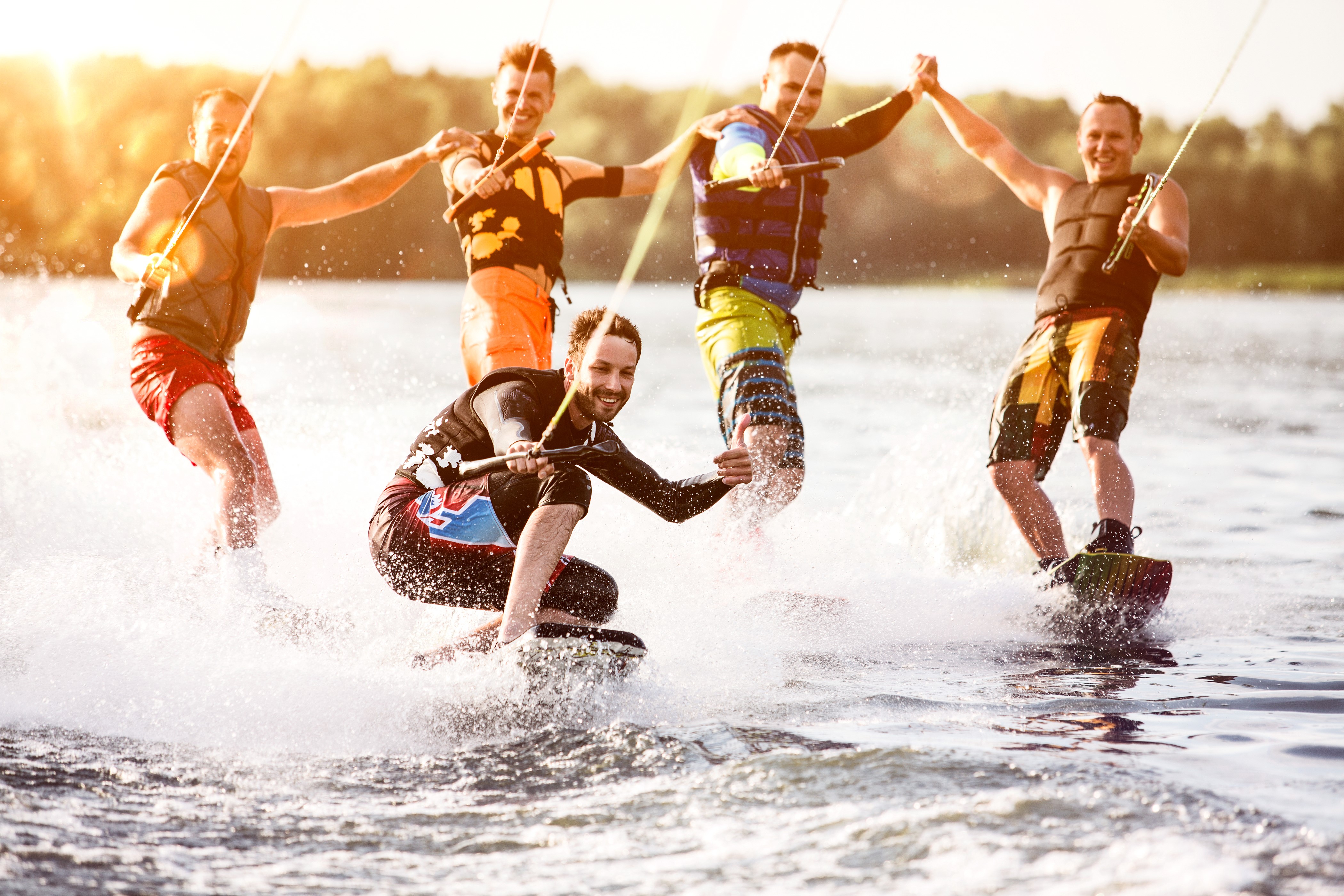 Men Wakeboarding on a Lake HD Wallpaper