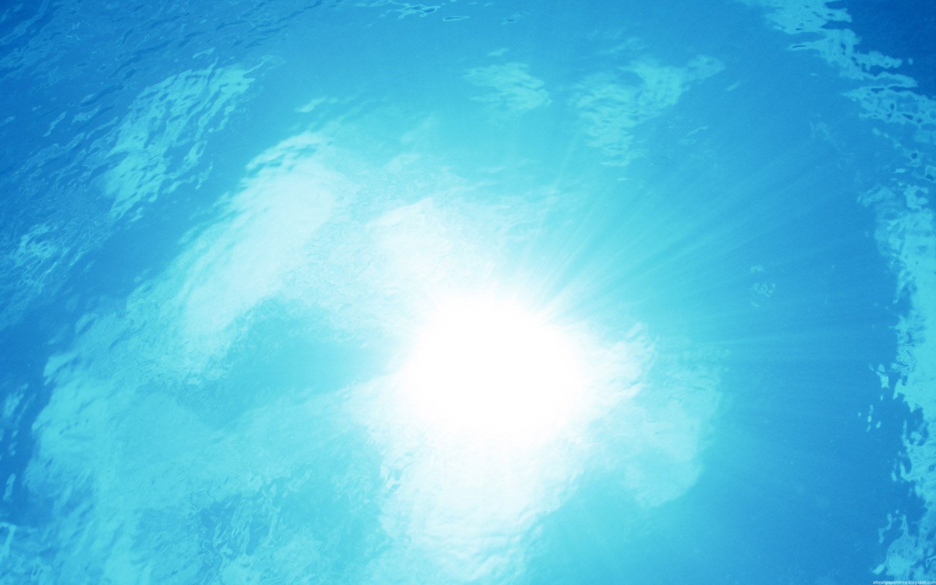 Sunlight shining through blue water HD Wallpaper
