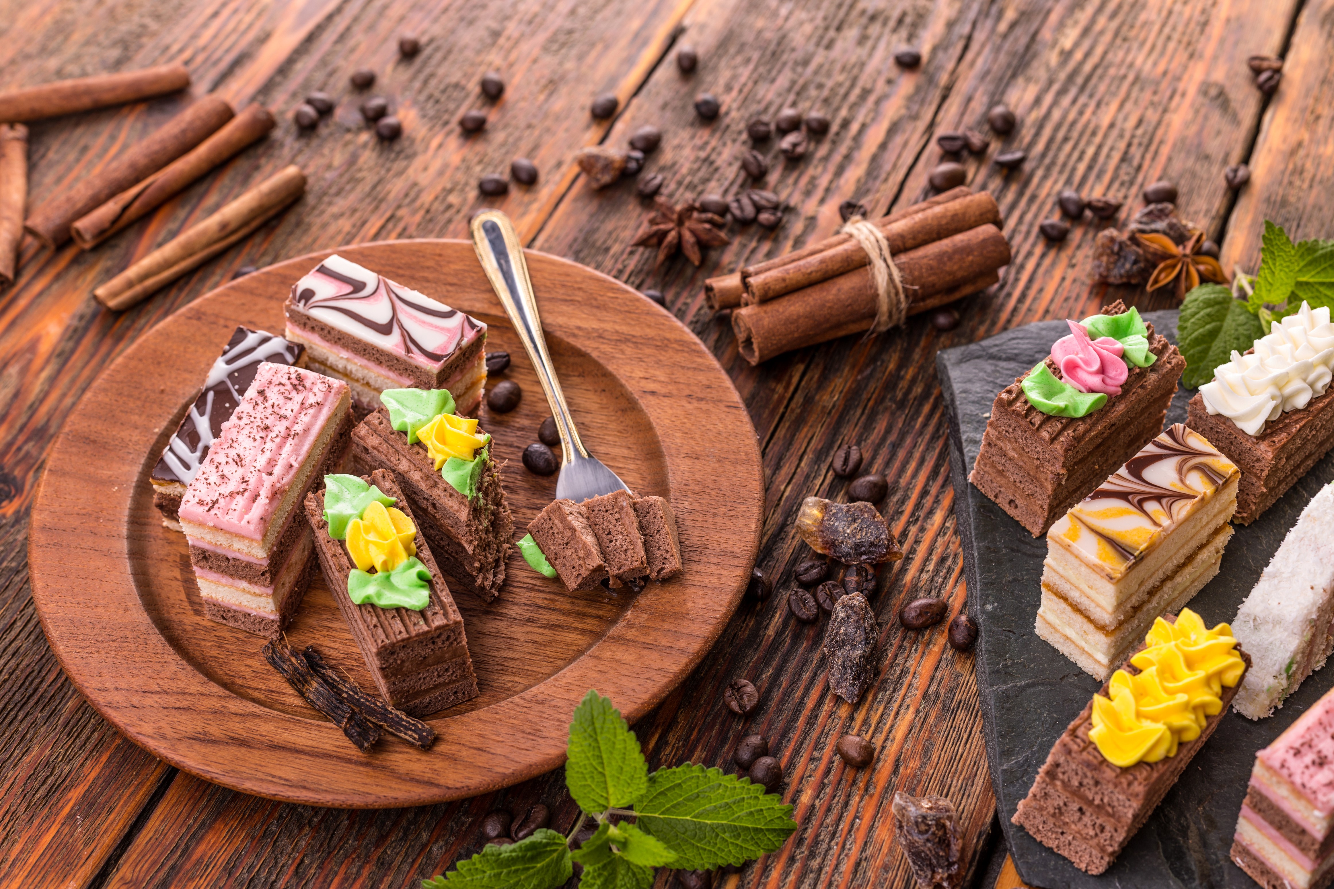 Assortment of Little Cakes with Cinnamon and Coffee HD Wallpaper