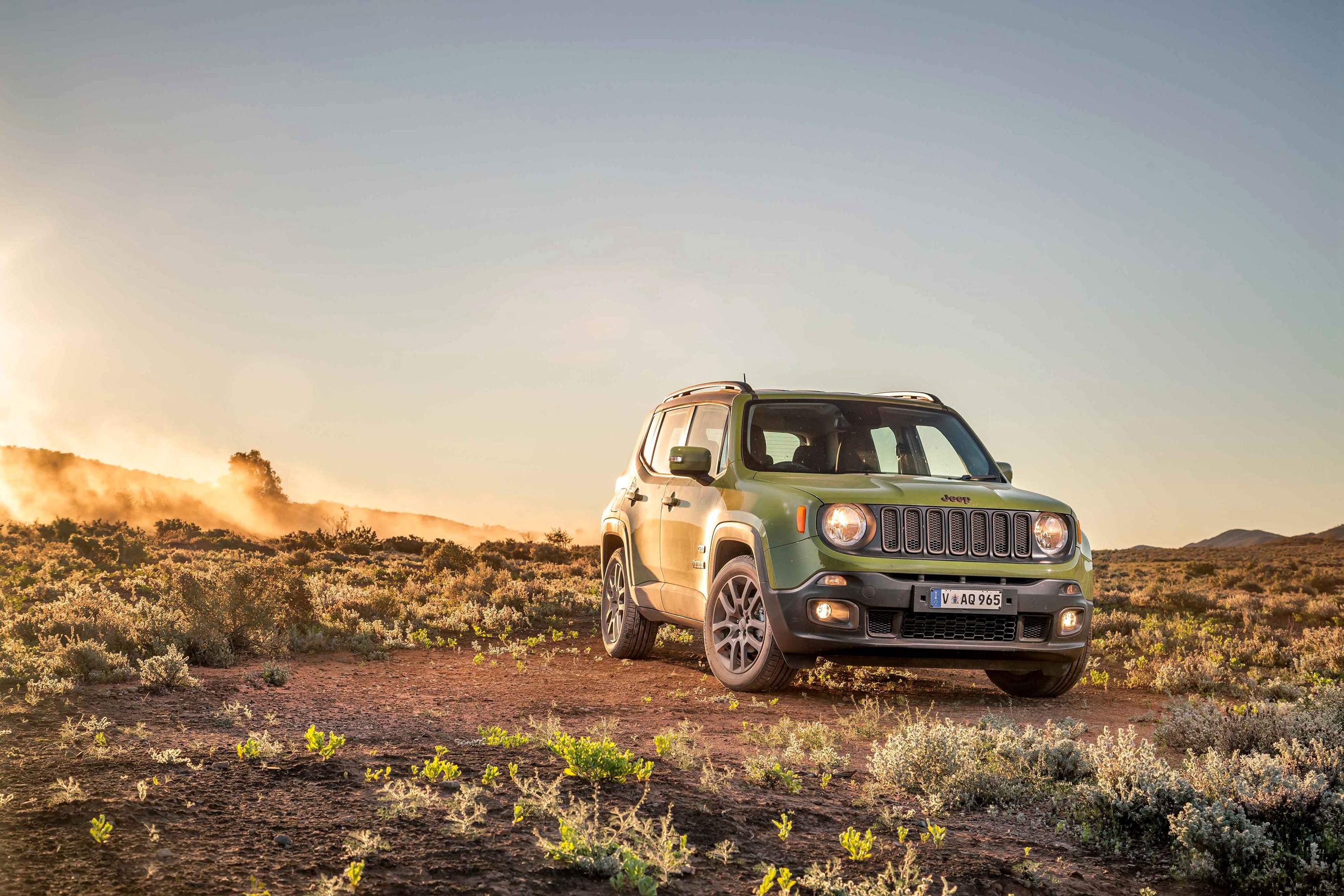 Green Jeep Renegade 75th Anniversary in a Dry Landscape HD Wallpaper