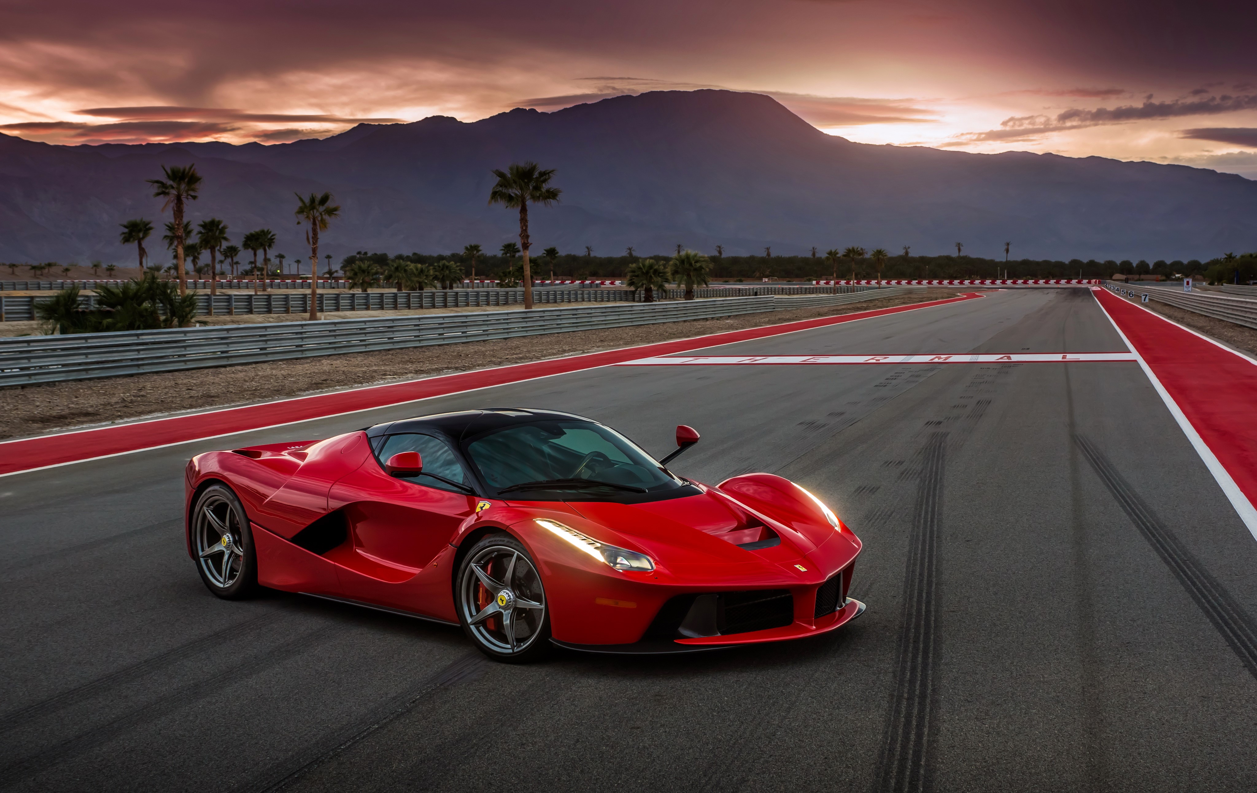 Red Ferrari LaFerrari on a Race Track HD Wallpaper