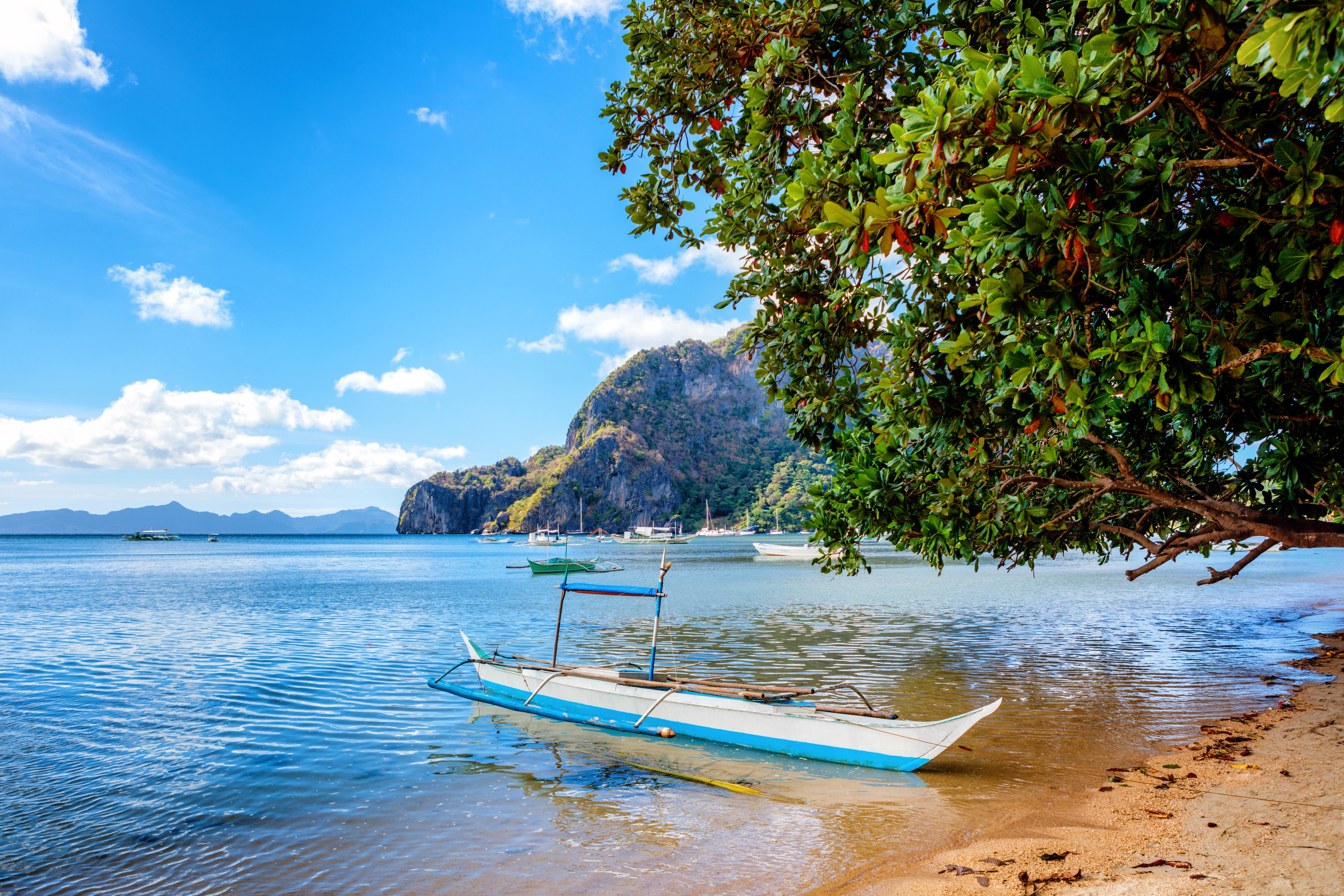 Philippines Coast with Boats and Mountains HD Wallpaper