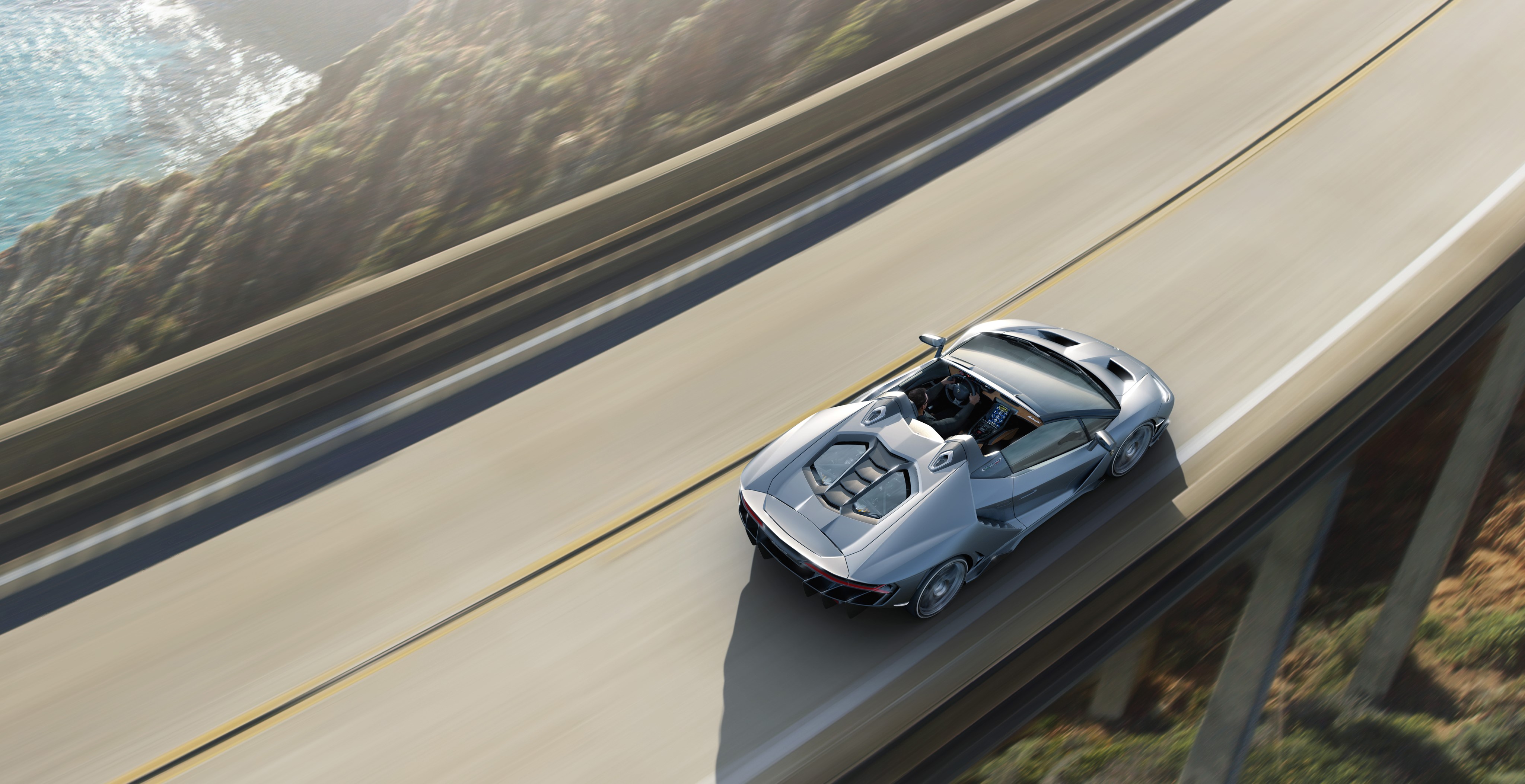 4K Lamborghini Centenario Roadster driving on a coastal road HD Wallpaper