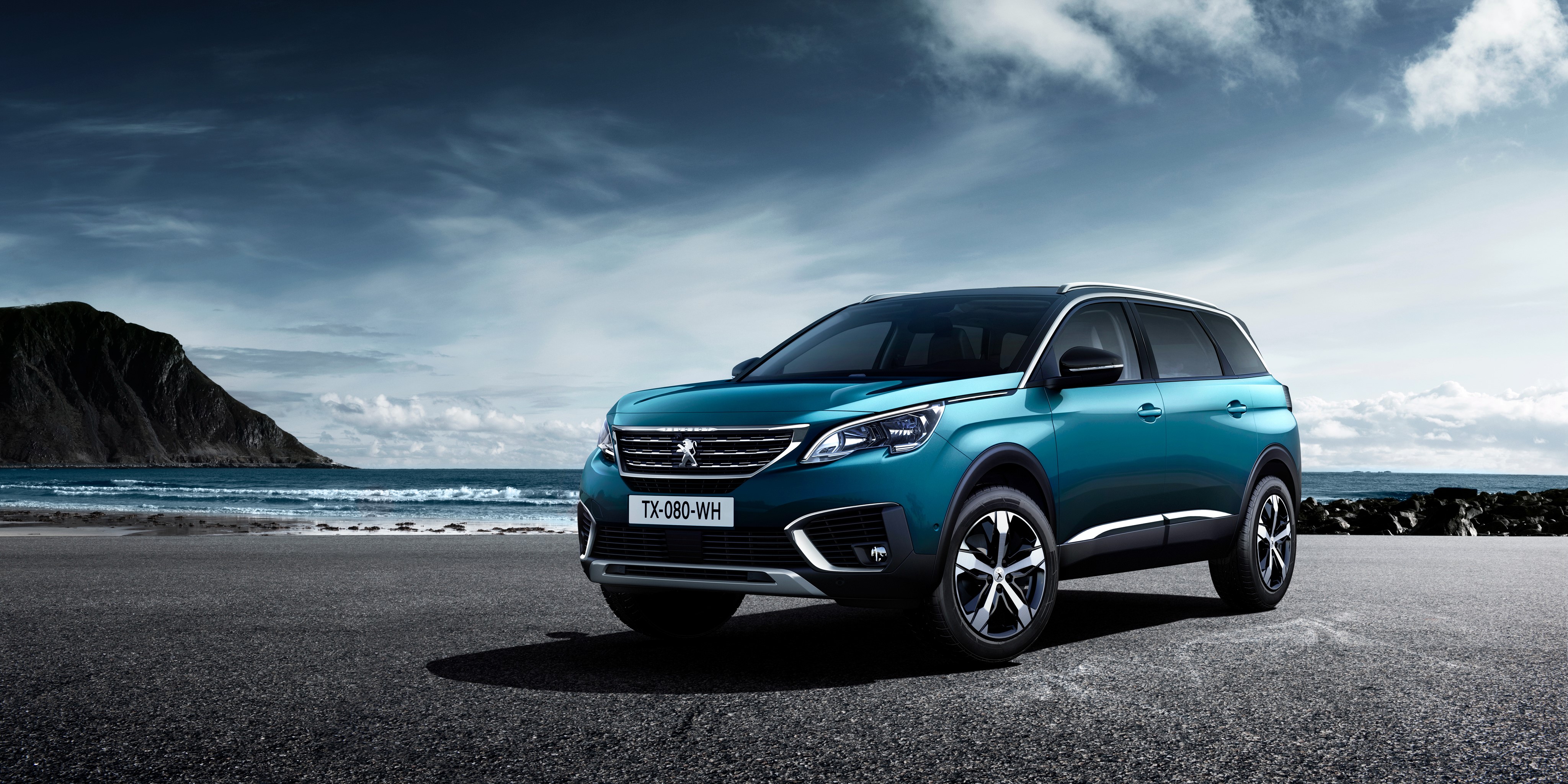 Peugeot 5008 SUV on a beach HD Wallpaper