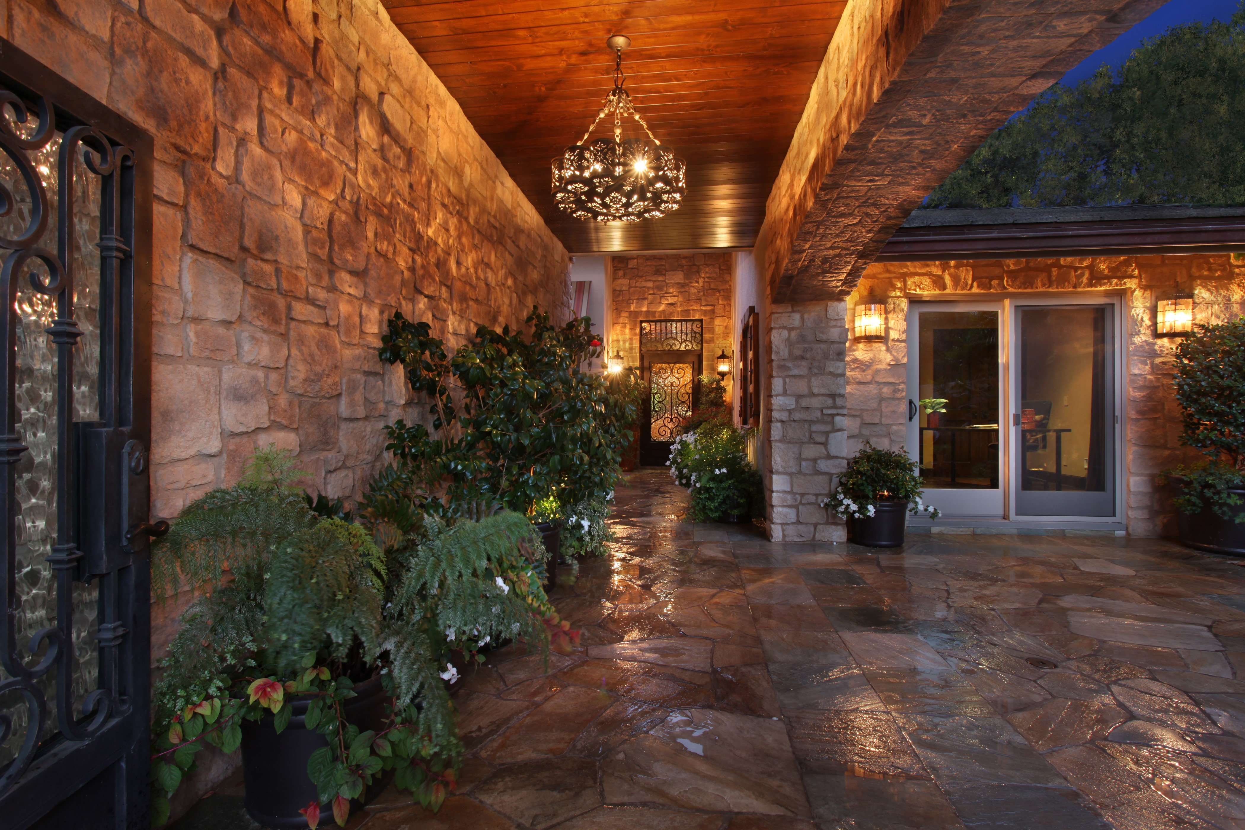 Stone Walkway with Chandelier and Plants HD Wallpaper