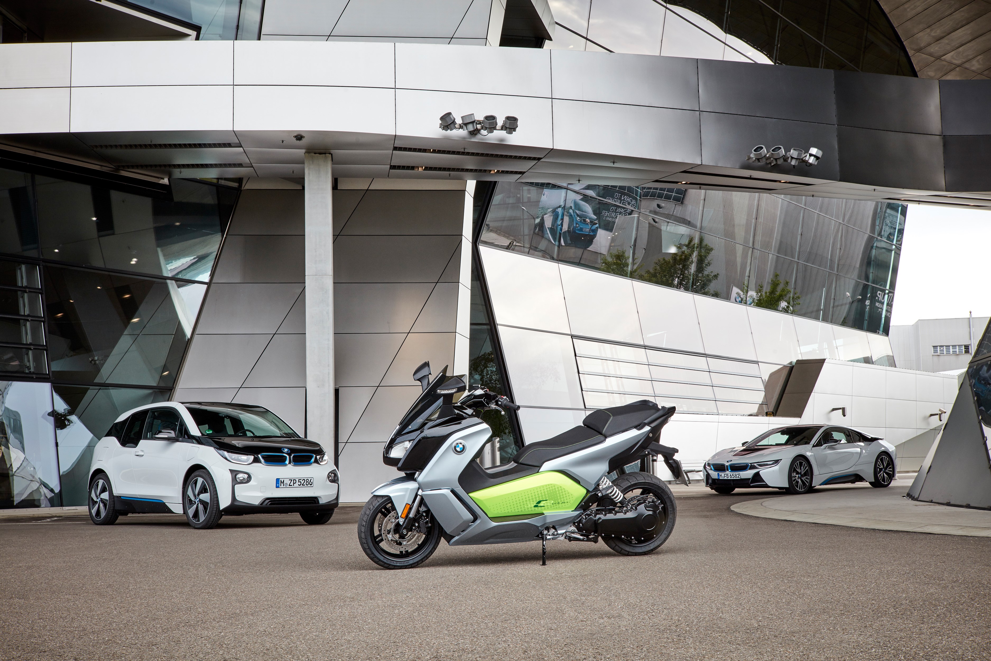 BMW electric vehicles and scooter at BMW Welt HD Wallpaper