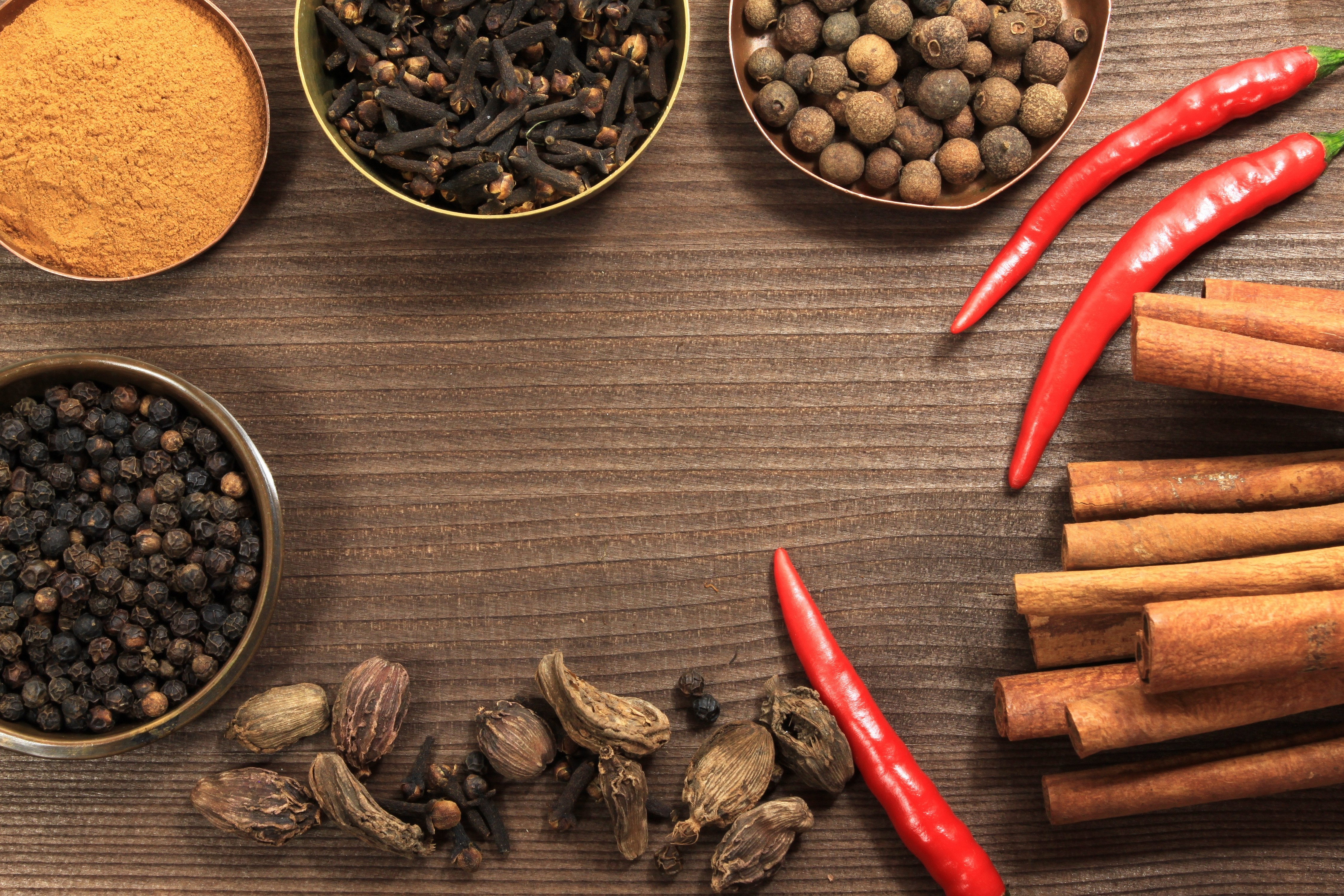 Spices: Black pepper, cloves, cinnamon, chili peppers, and allspice HD Wallpaper