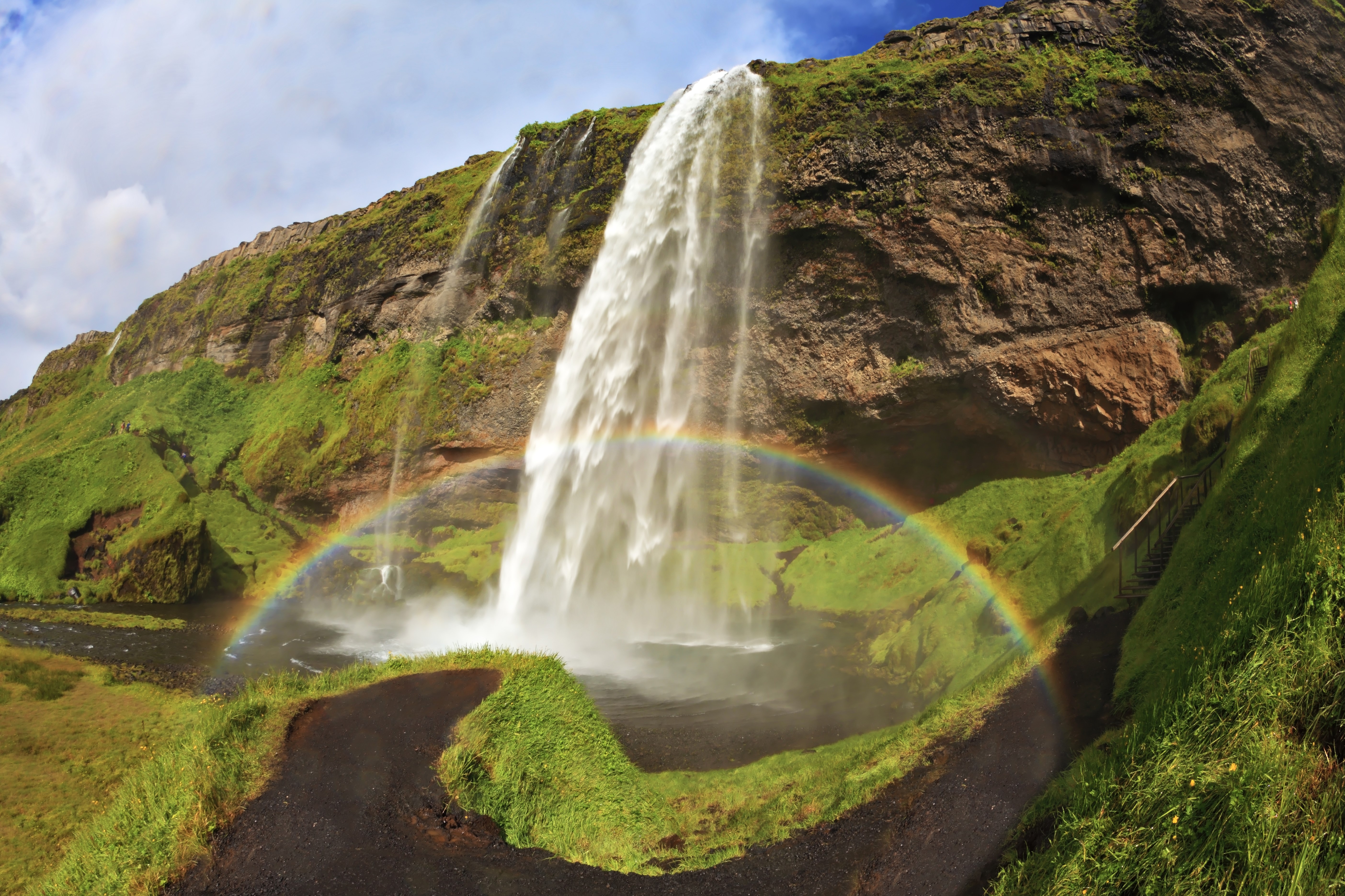 Seljalandsfoss waterfall with rainbow in Iceland HD Wallpaper