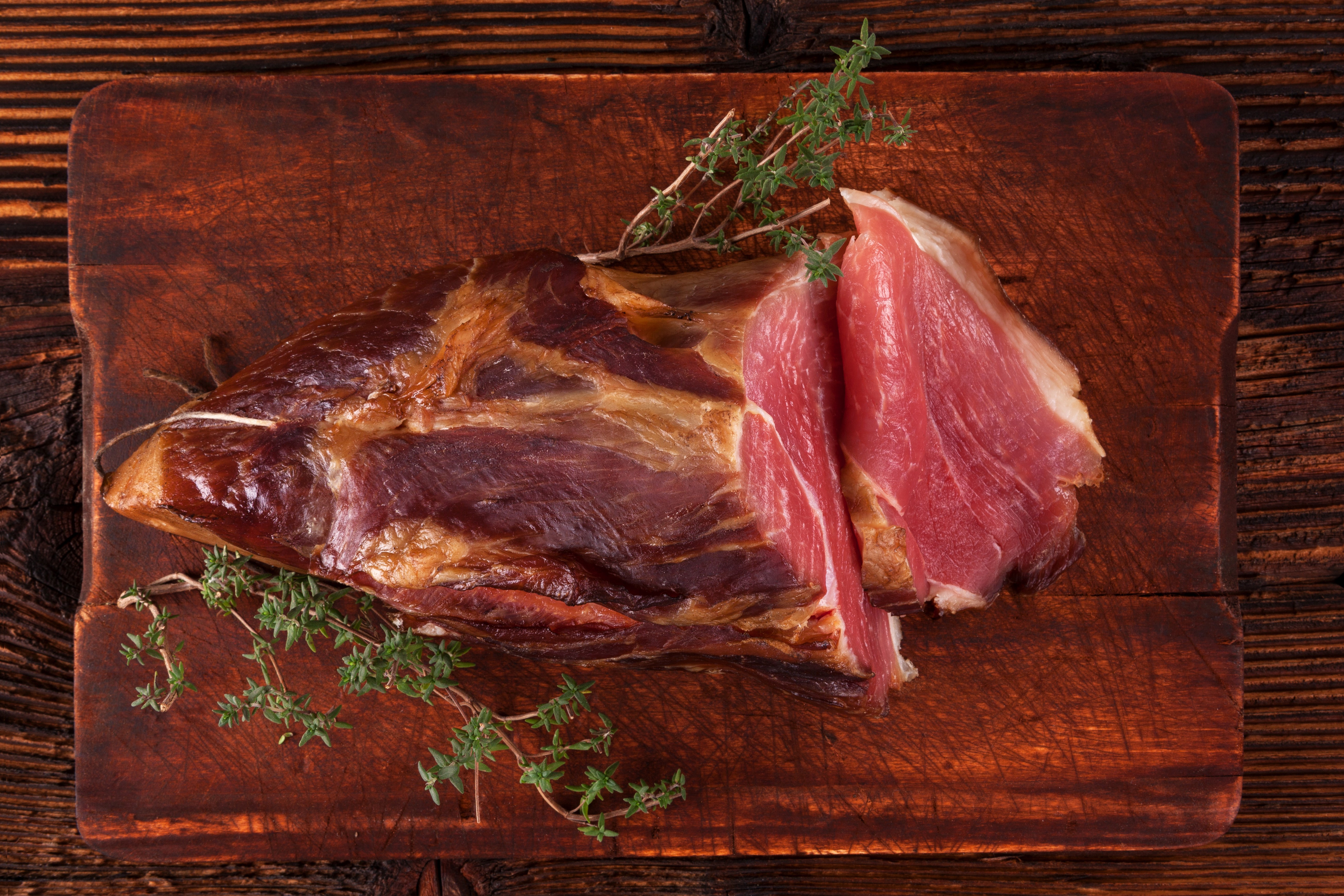 Smoked Ham on a Wooden Cutting Board HD Wallpaper