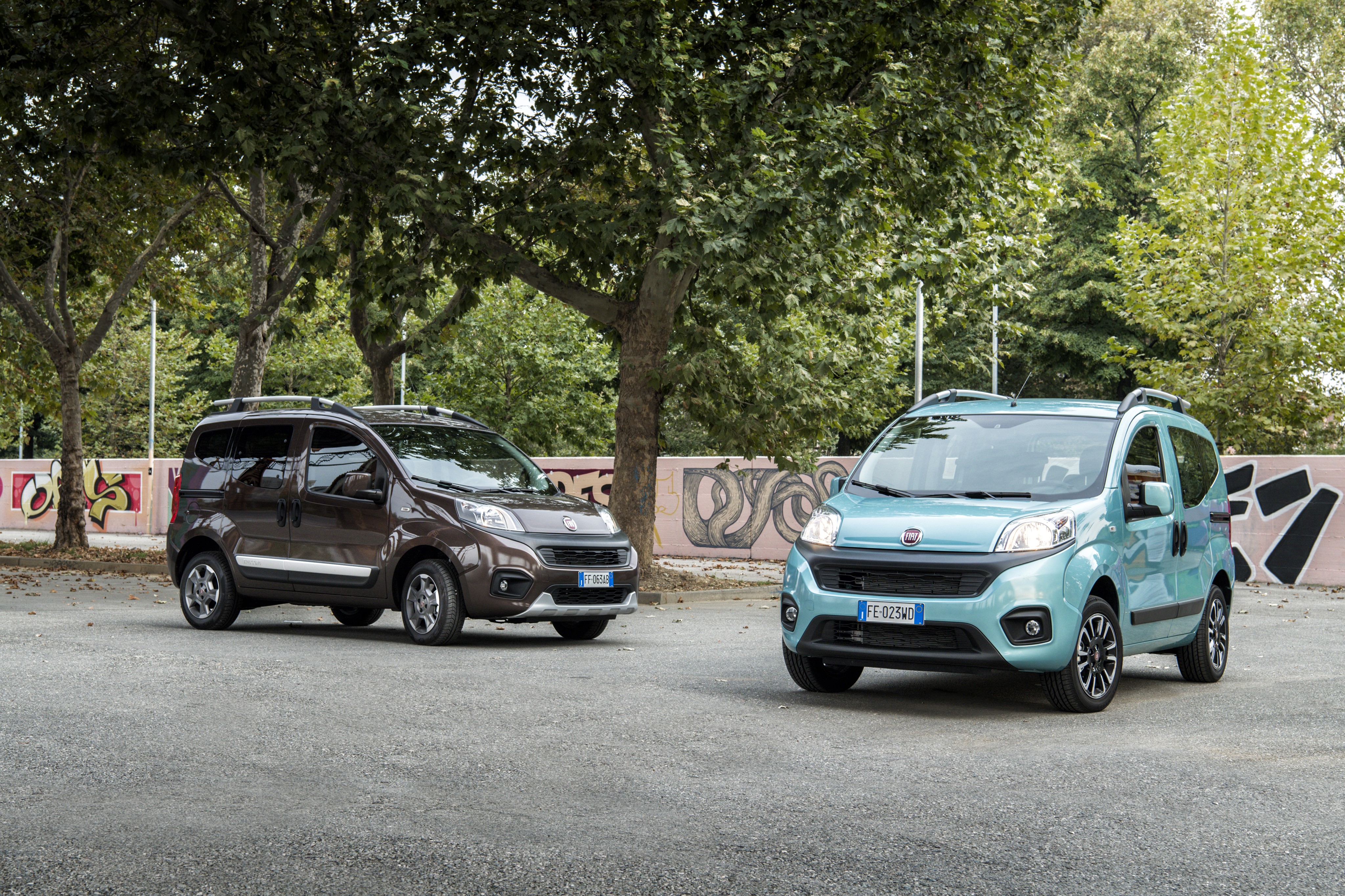 Two Fiat Qubo cars parked outdoors HD Wallpaper