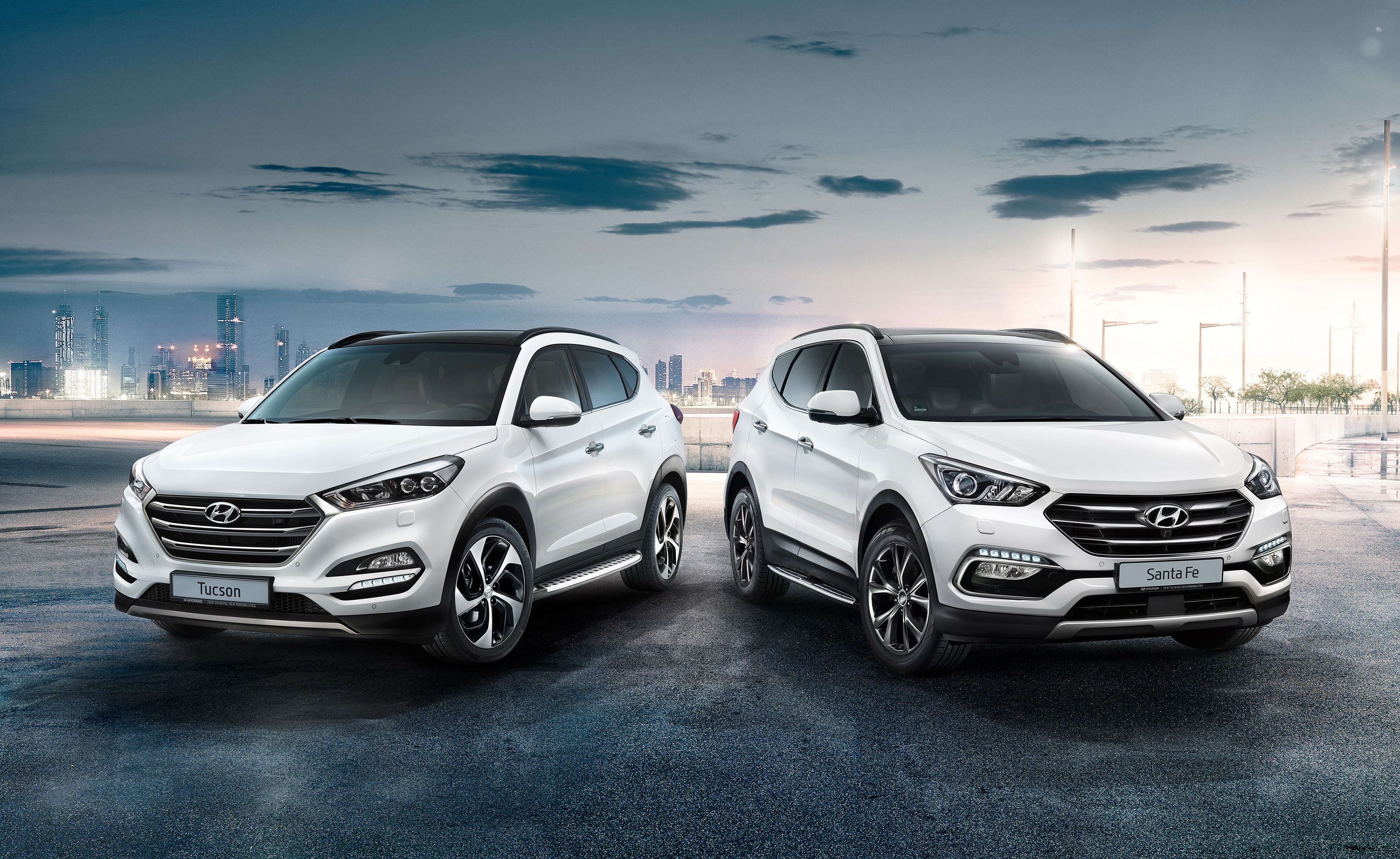Two white Hyundai Tucson and Santa Fe cars HD Wallpaper