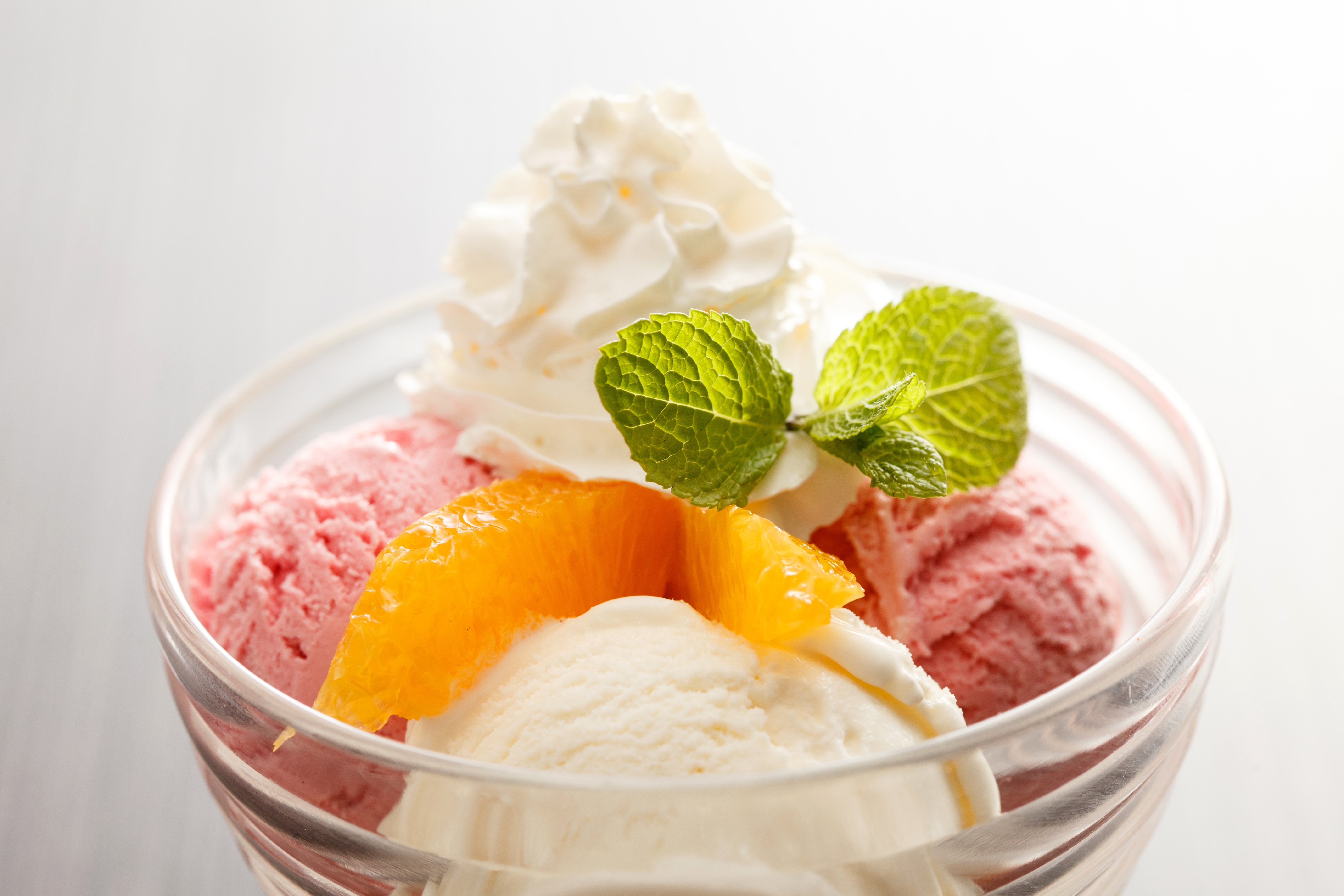 Ice cream sundae with whipped cream and mint HD Wallpaper