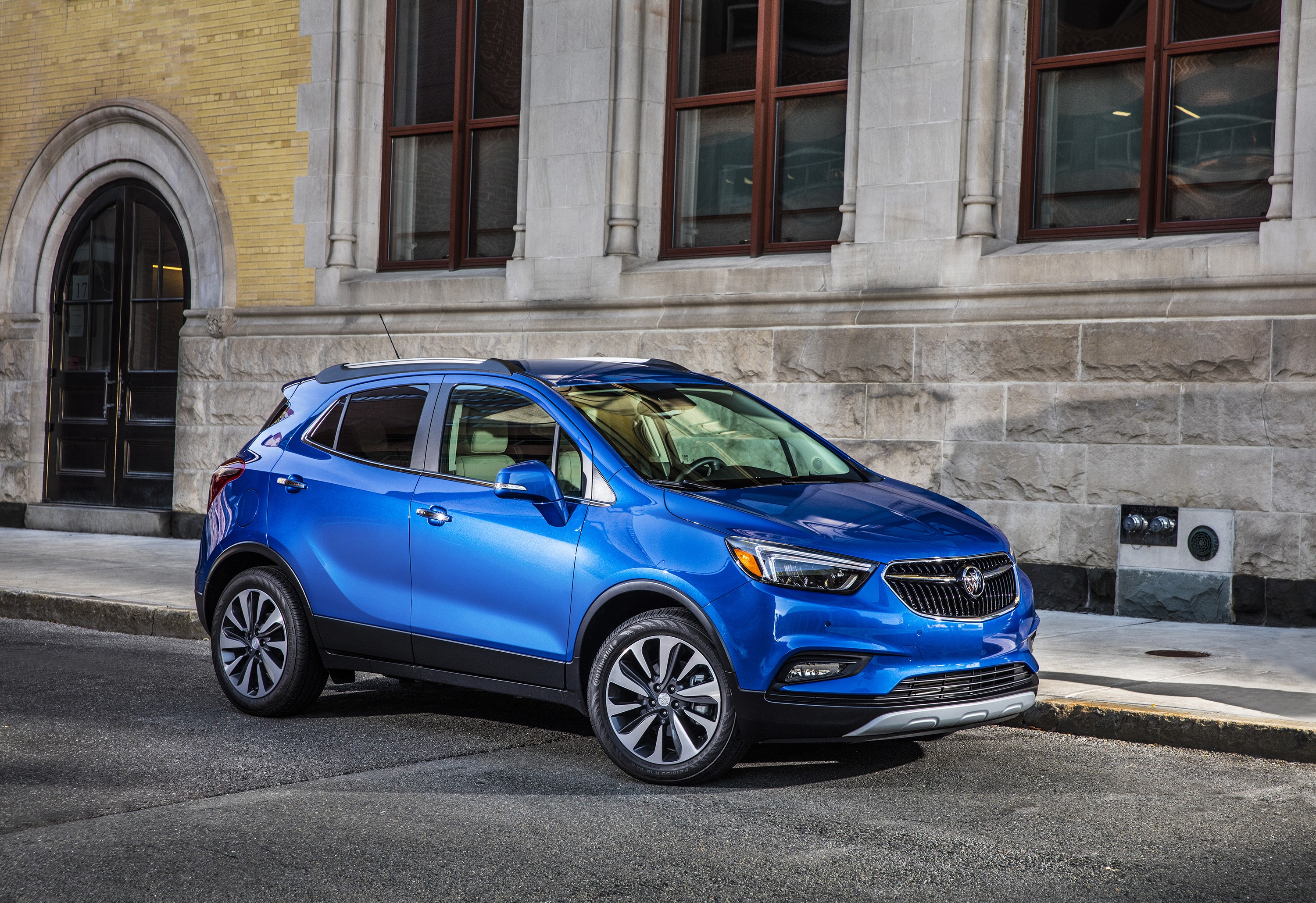 Blue 2017 Buick Encore parked on street HD Wallpaper
