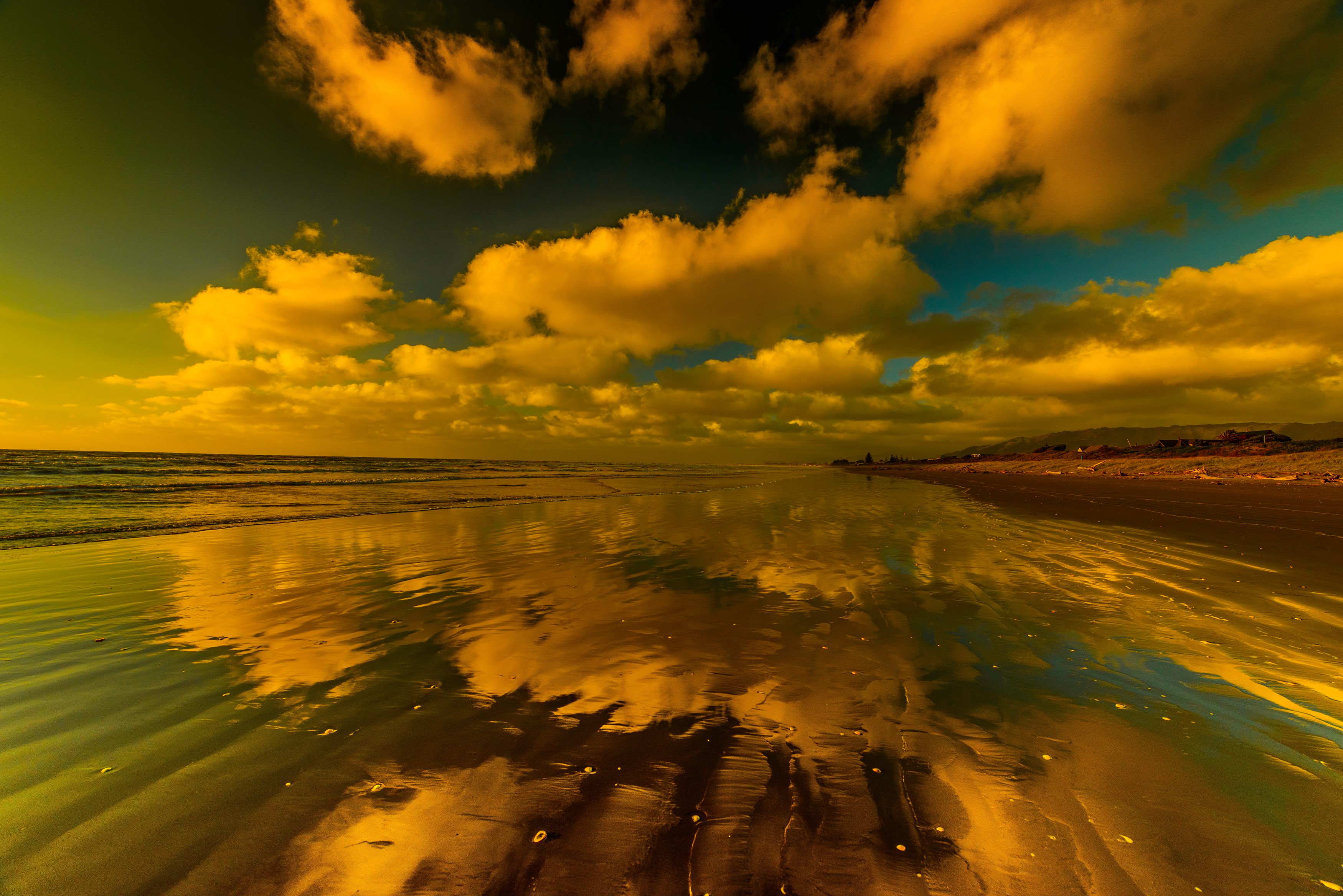Beach with reflection of clouds and ocean HD Wallpaper