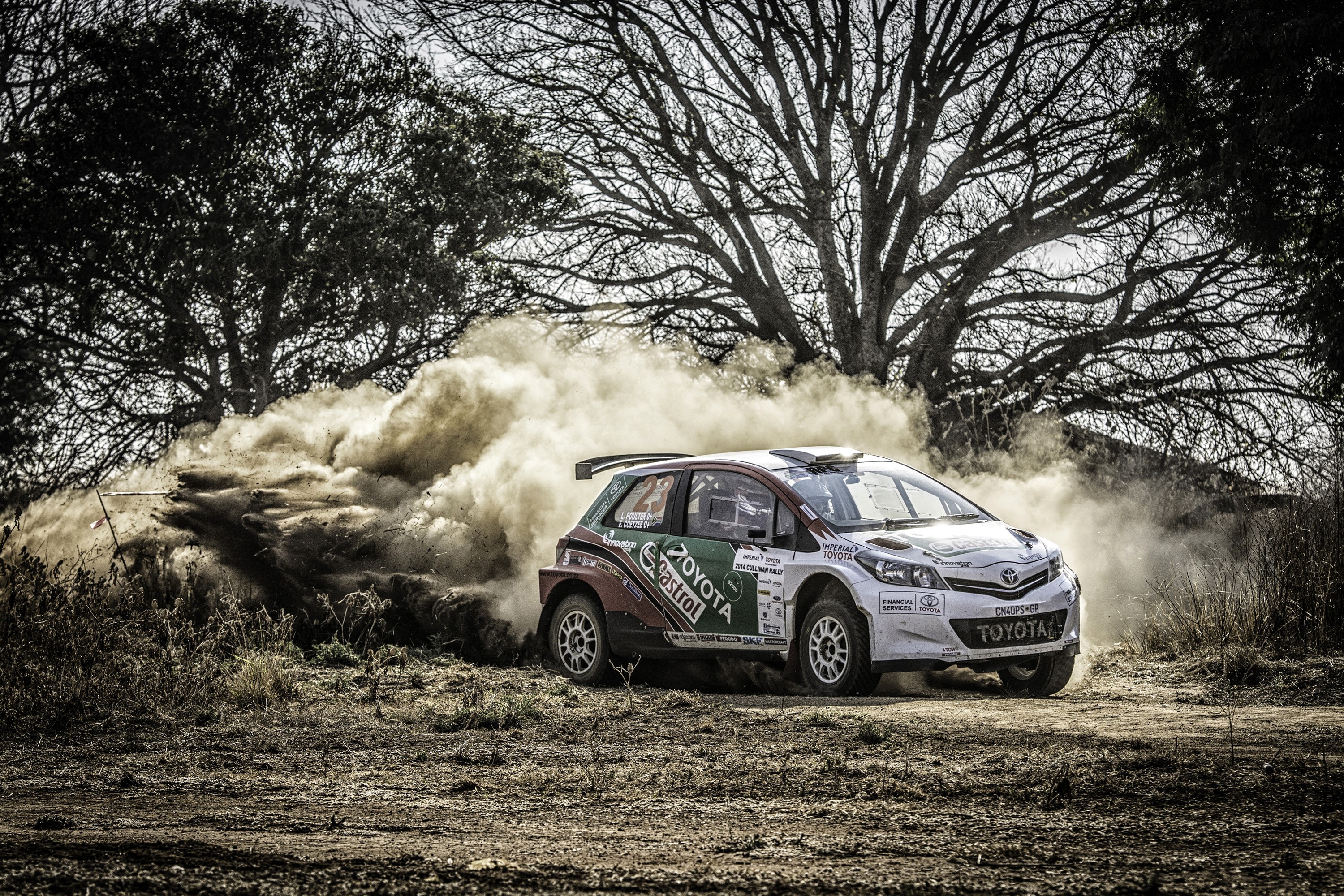 Toyota Yaris S2000 rally car kicking up dust HD Wallpaper