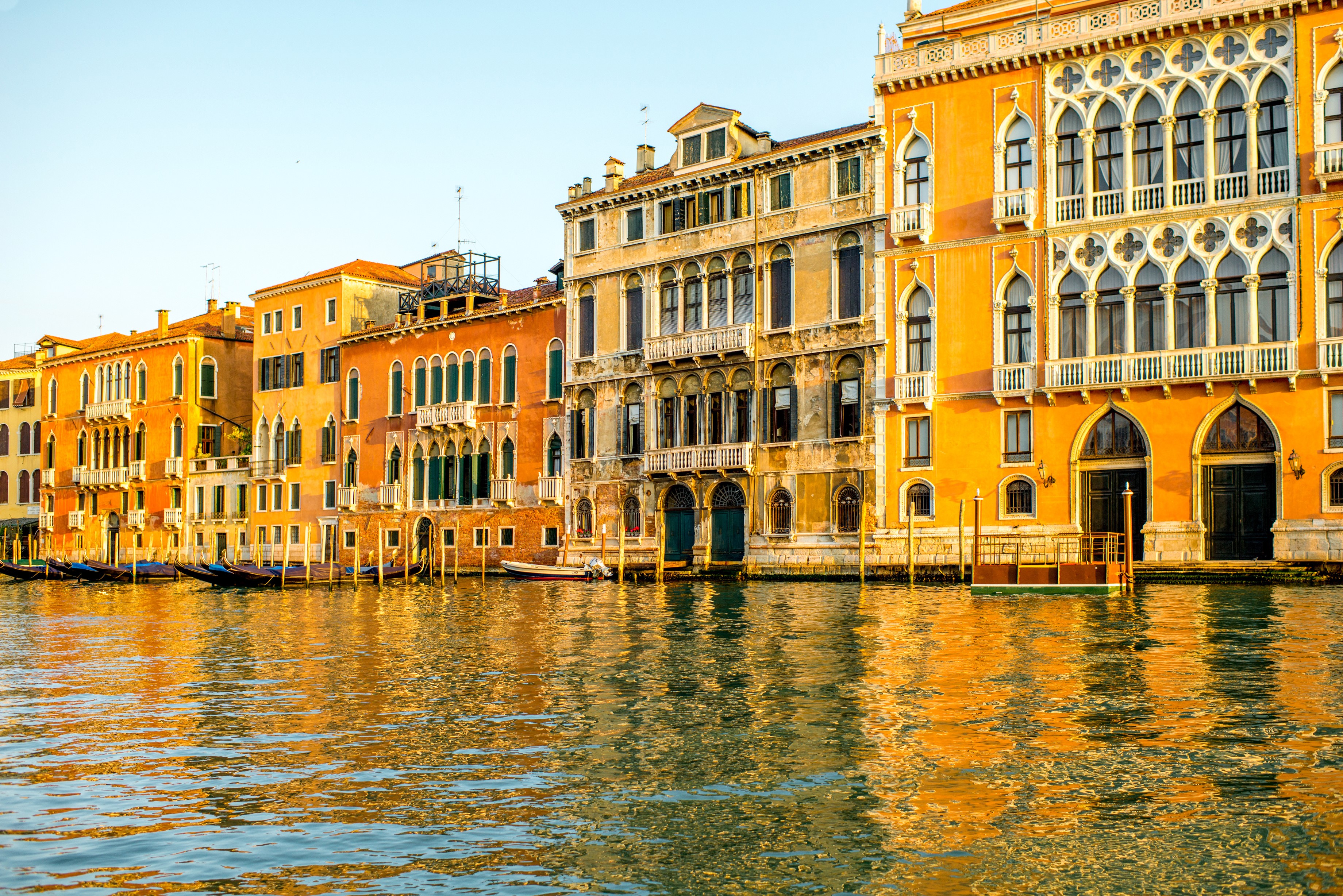 Venice canal with historic buildings and gondolas HD Wallpaper
