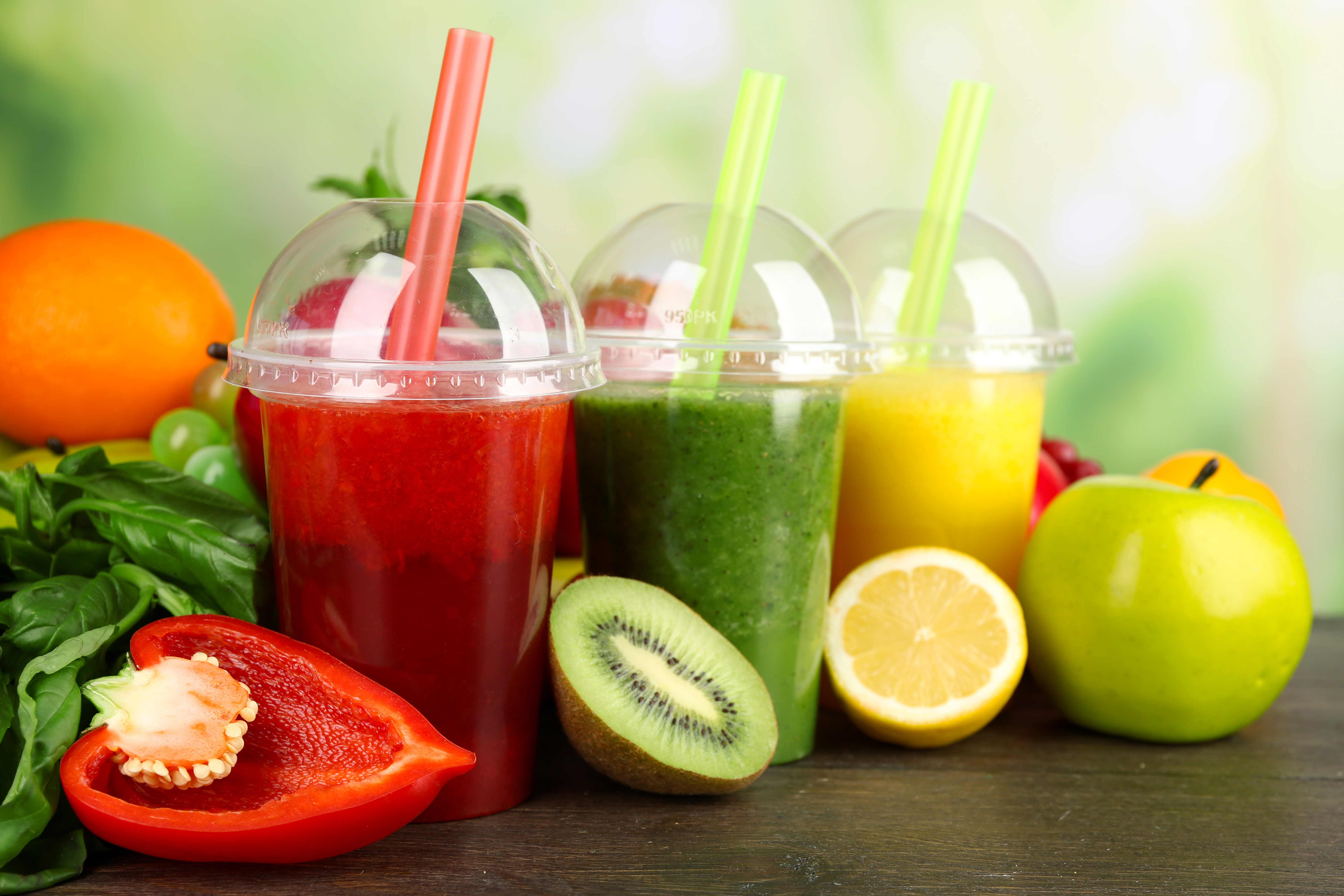 Three colorful smoothies with fruits and vegetables HD Wallpaper