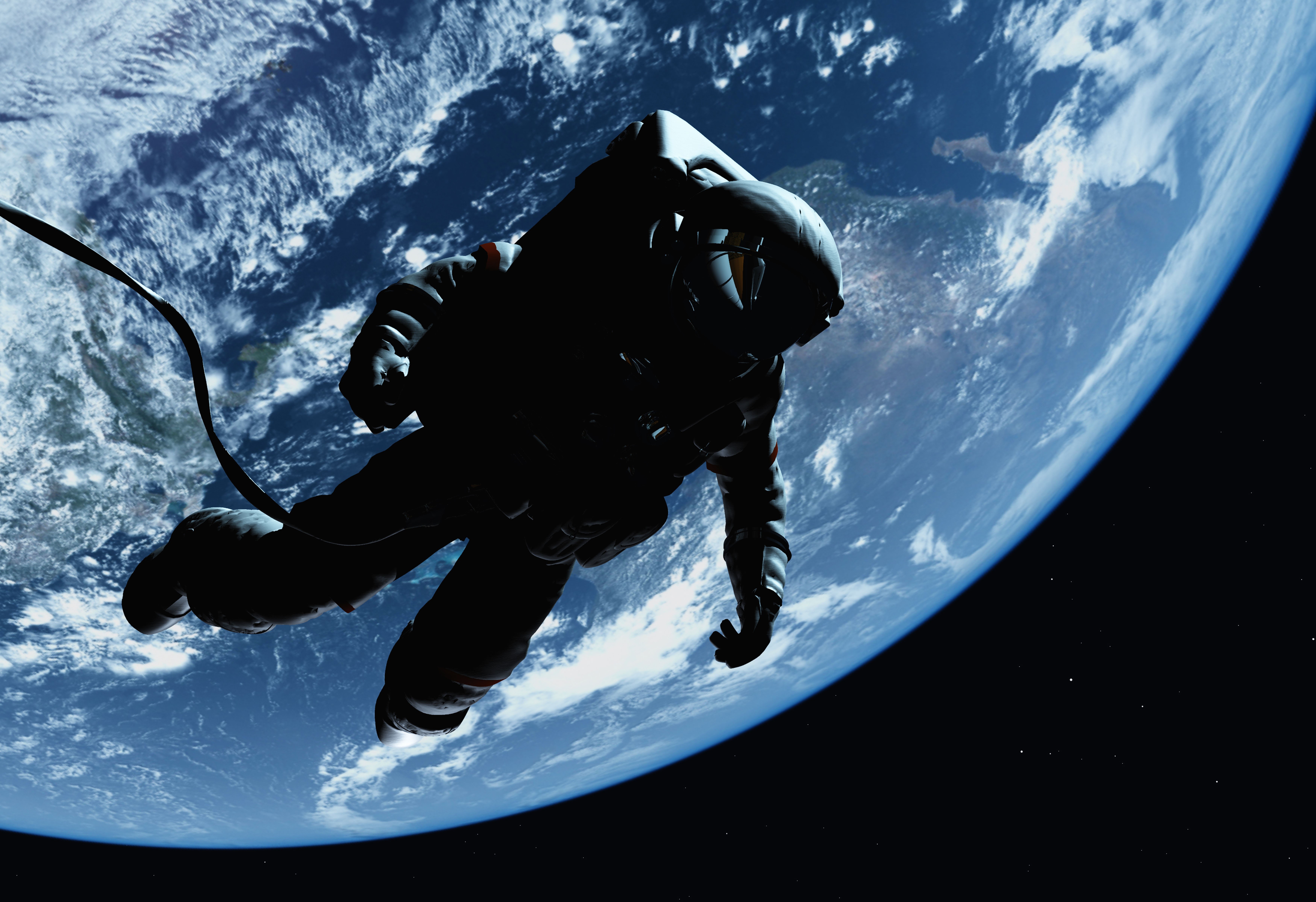 Astronaut floating above Earth HD Wallpaper